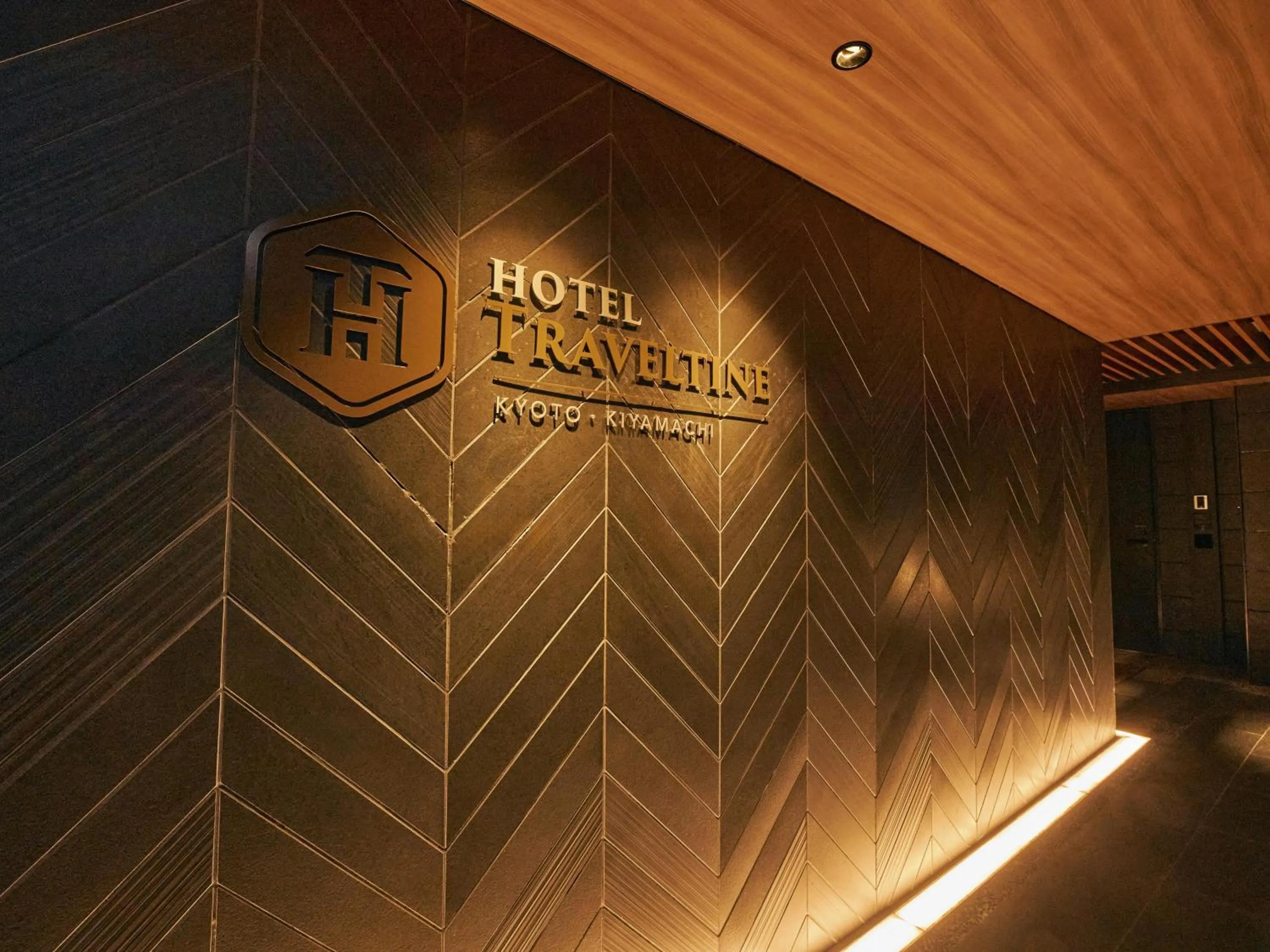 Property logo or sign in Hotel Traveltine Kyoto Kiyamachi