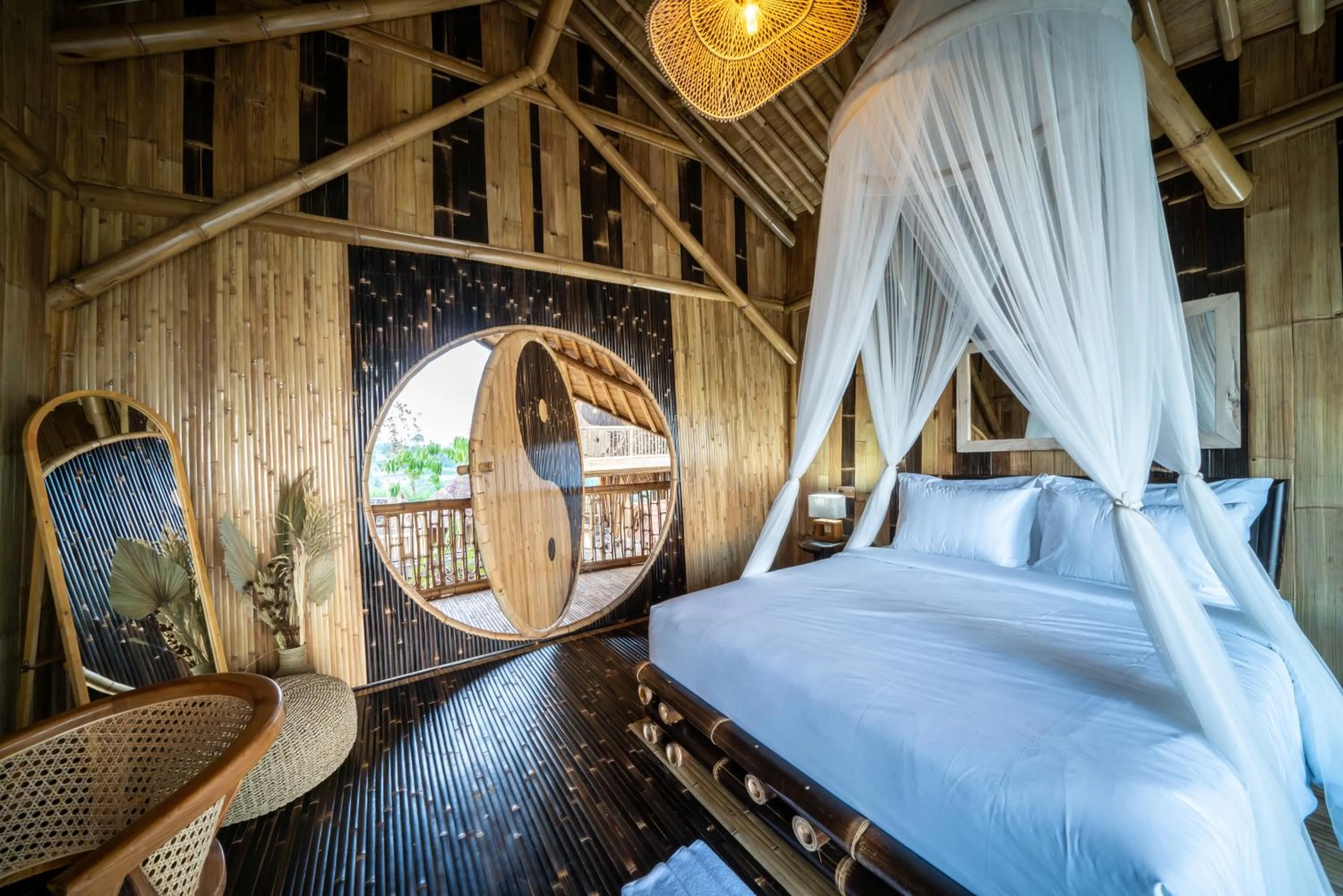 Bed in The Dewi Eco Bamboo Villa