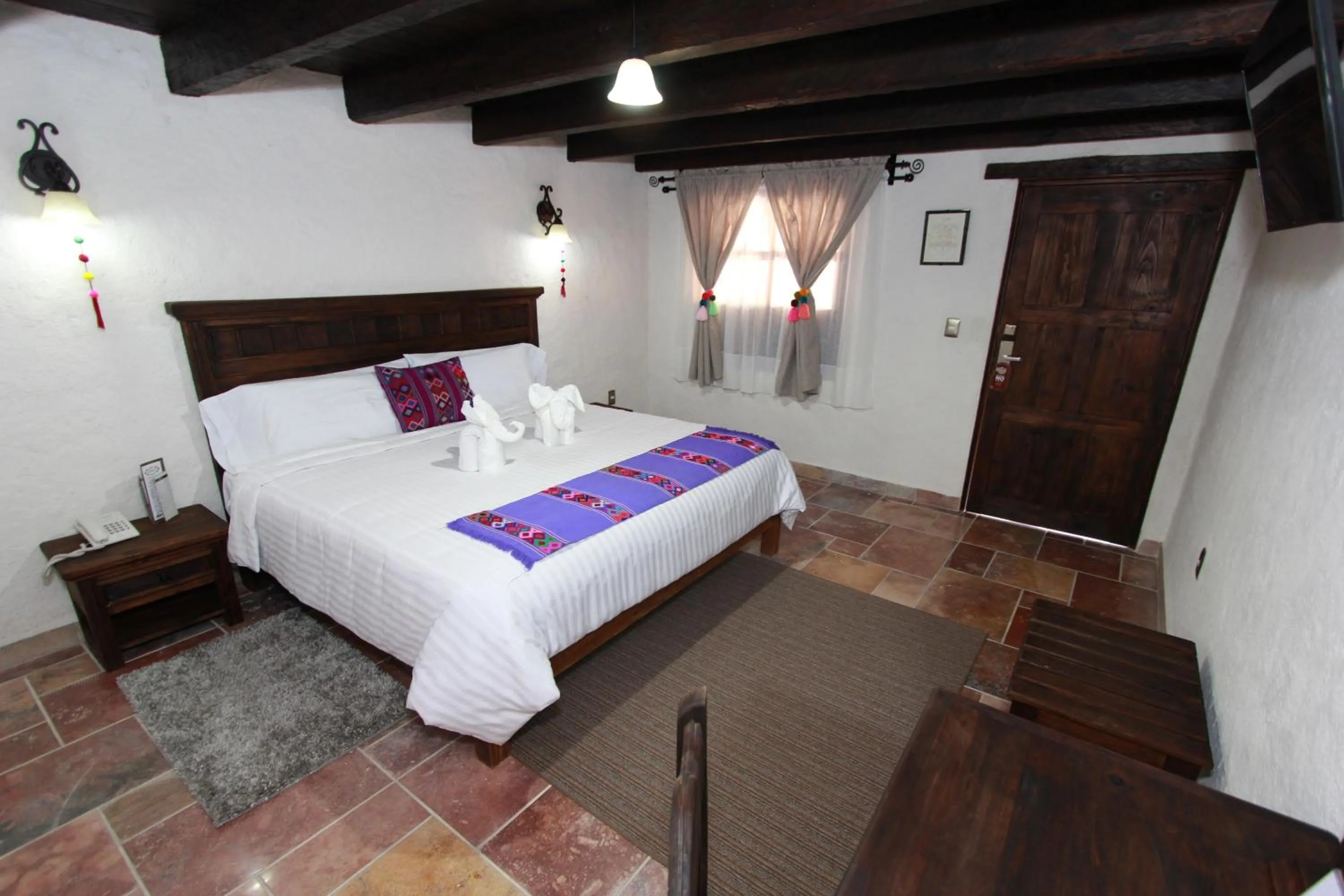 Bed in HOTEL PLAZA SAN CRISTOBAL INN