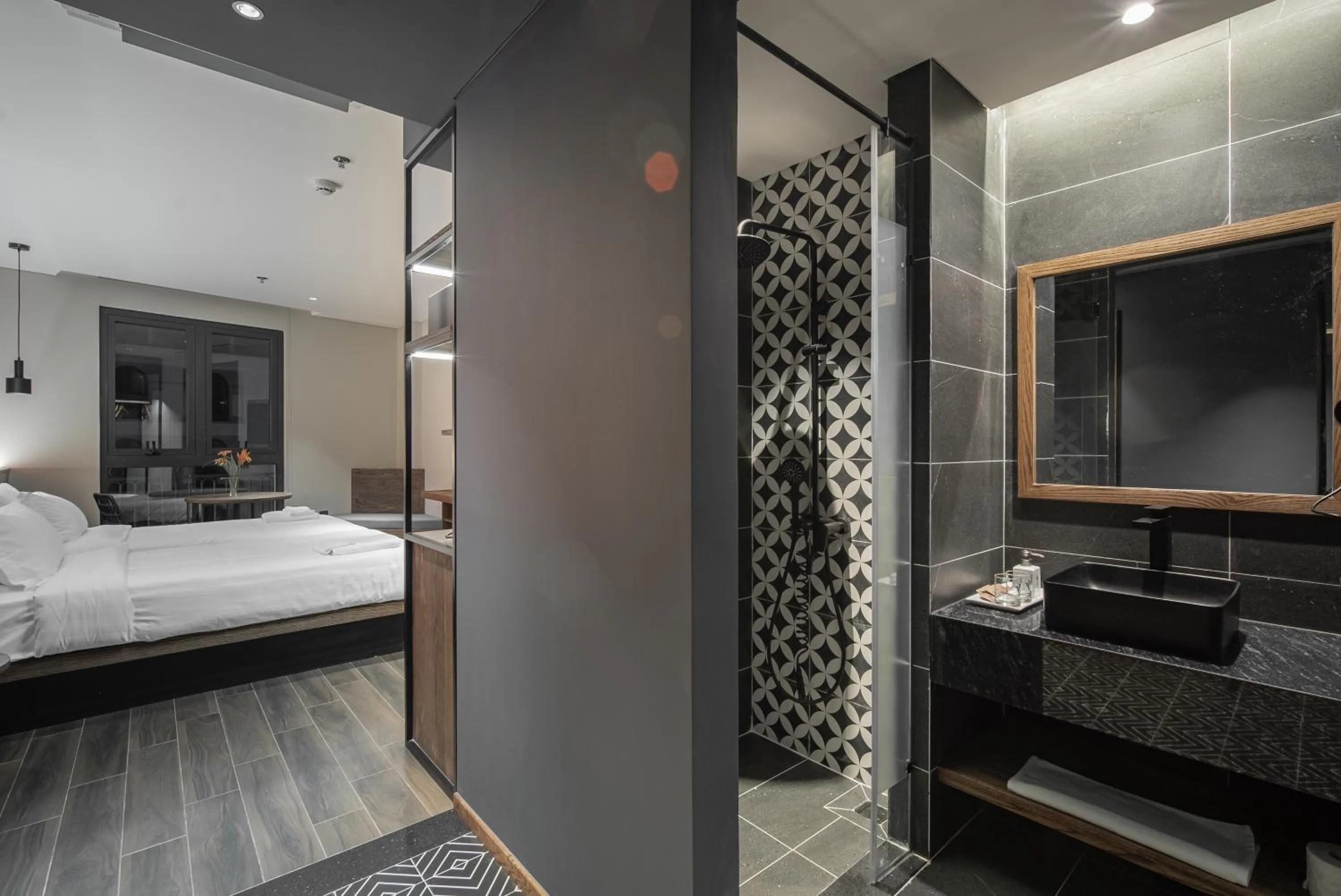 Photo of the whole room, Bed in TK Phu Quoc Hotel - Grand World Phu Quoc