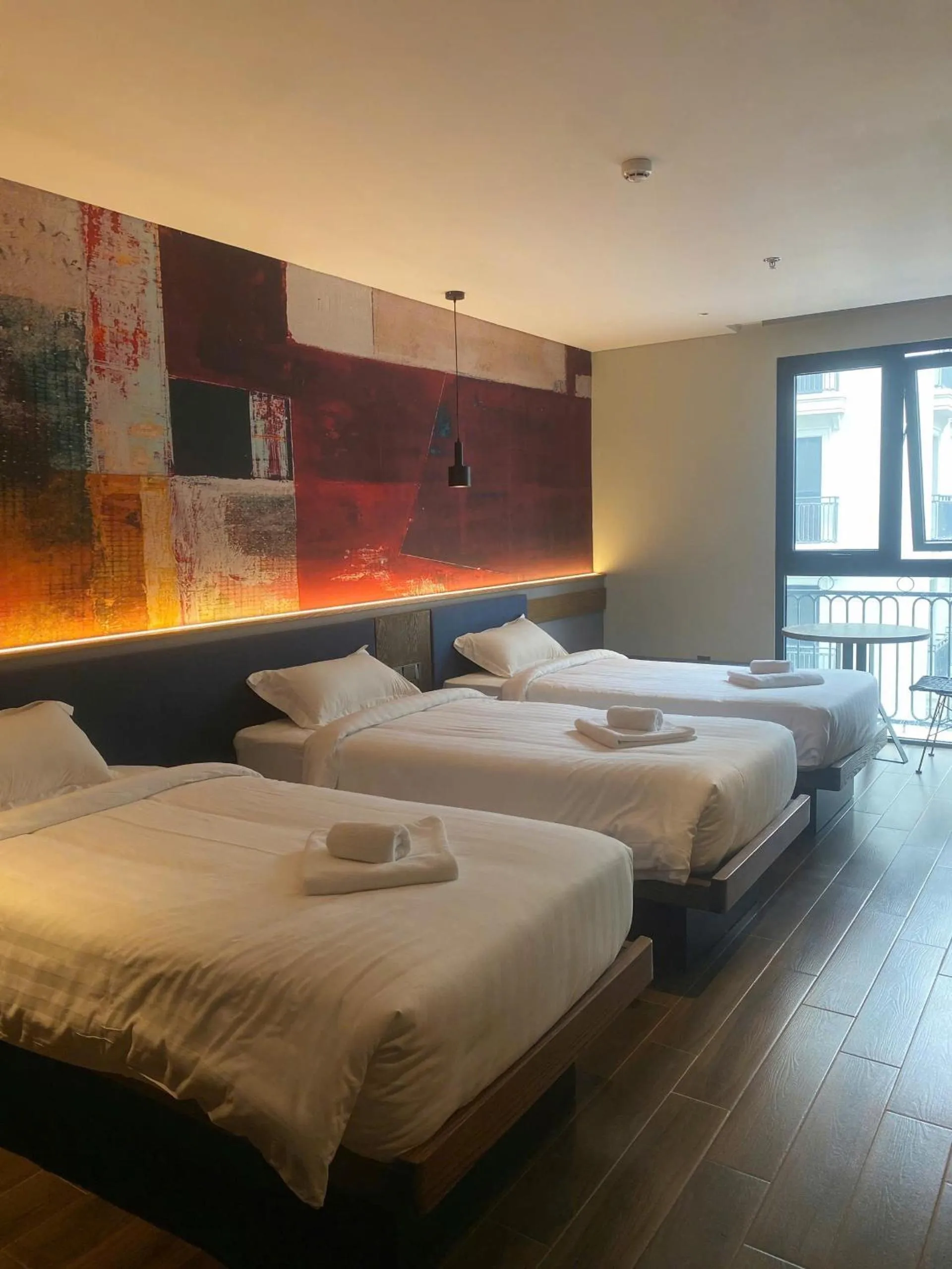 Photo of the whole room, Bed in TK Phu Quoc Hotel - Grand World Phu Quoc