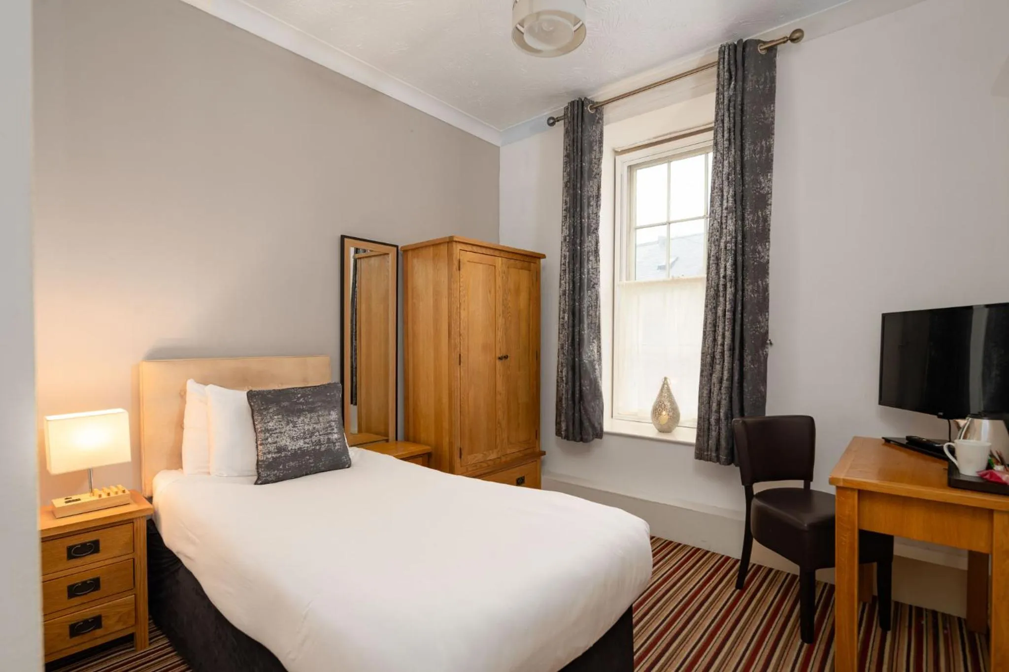 Bed in Boars Head Hotel