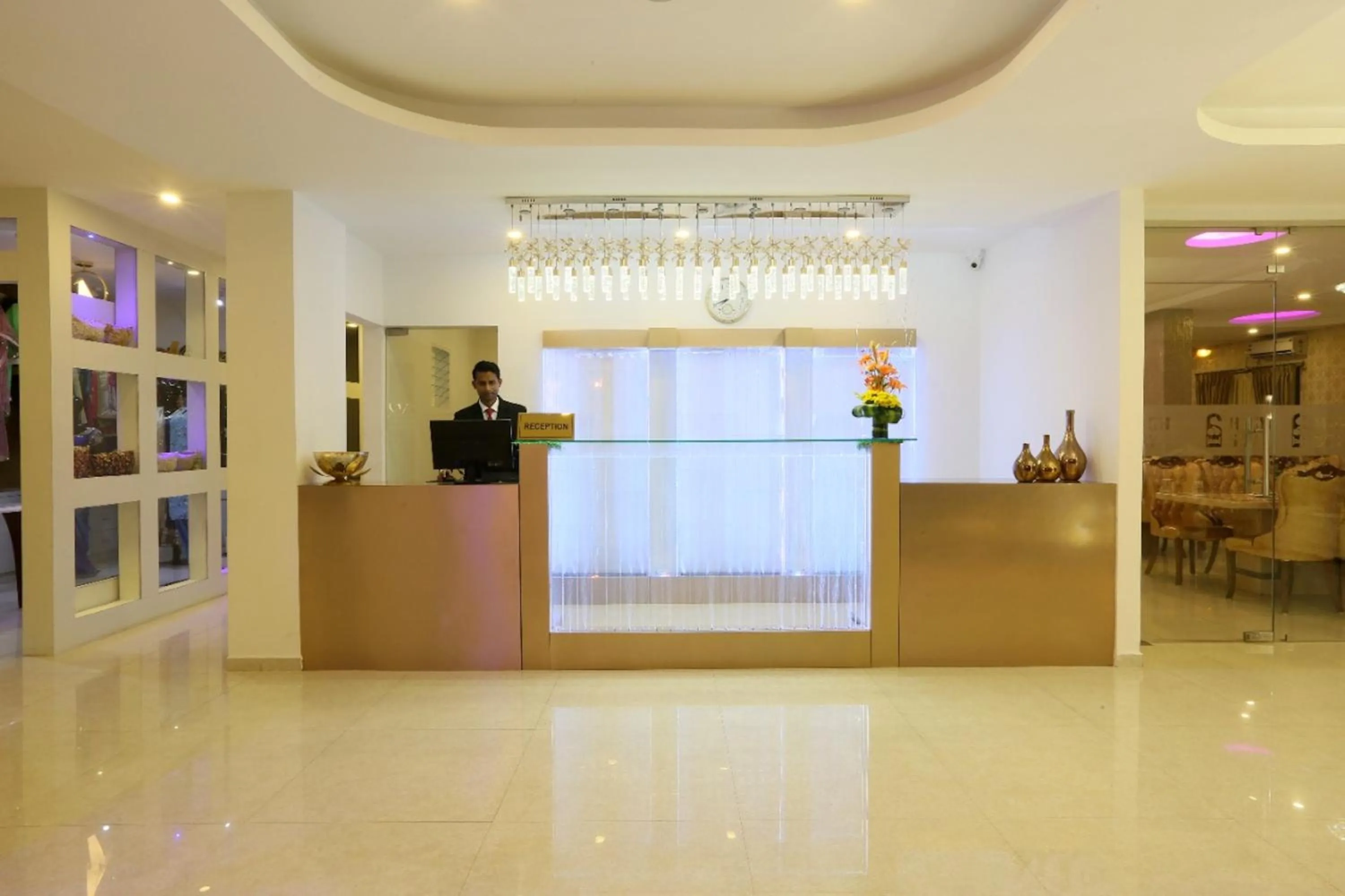 Lobby or reception in Premier Suites Business Hotel