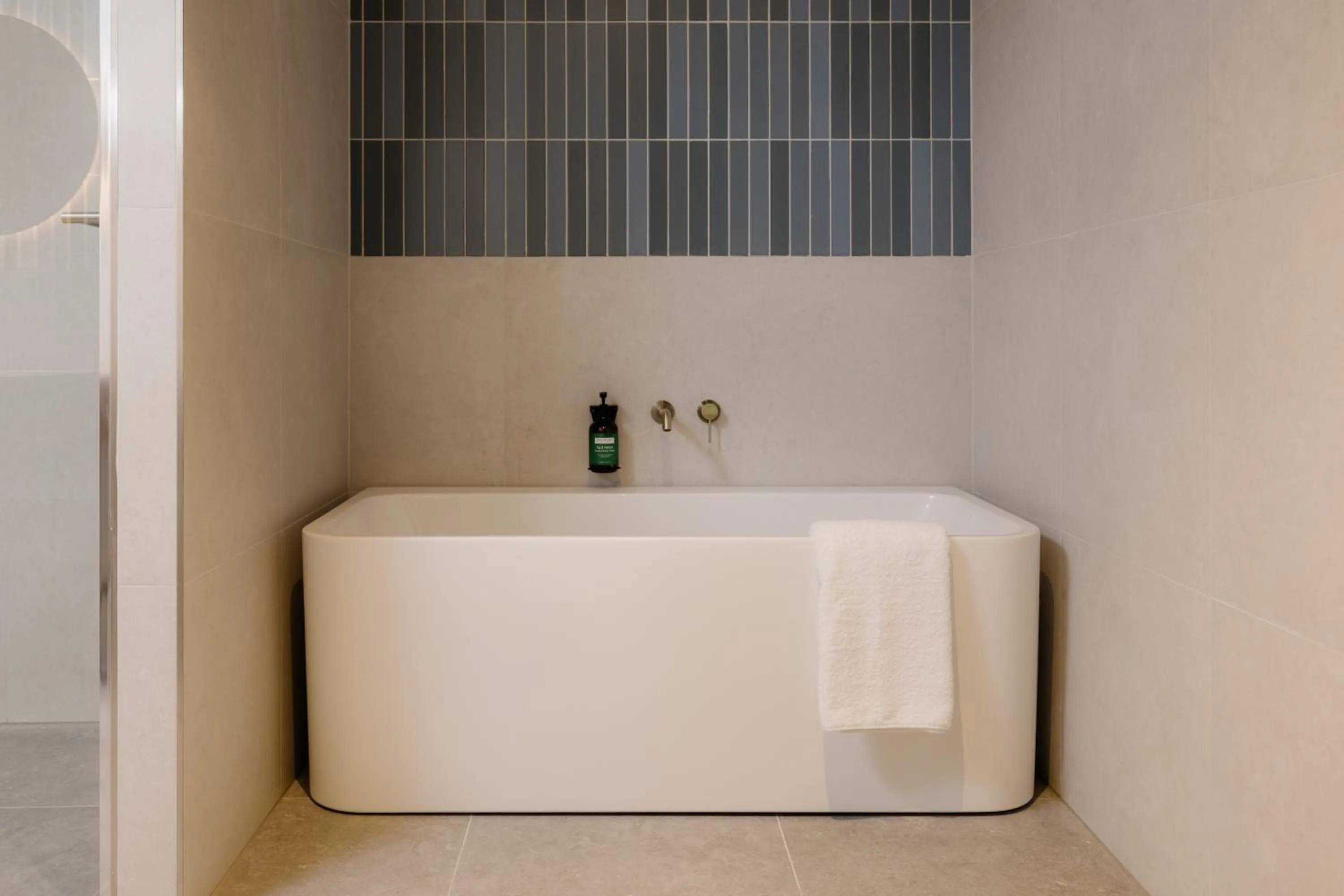 Bathroom in Crowne Plaza Adelaide Mawson Lakes by IHG