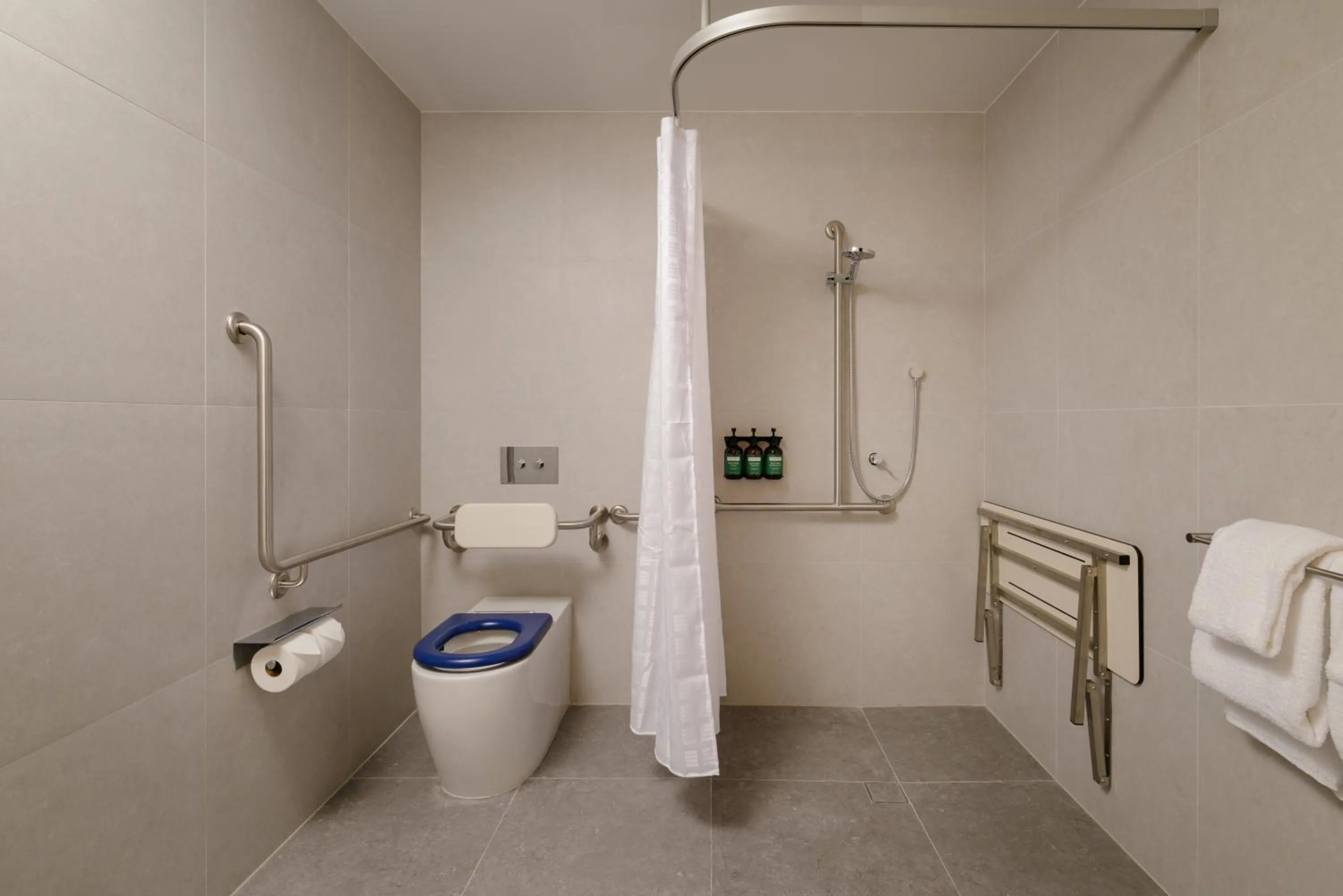 Bathroom in Crowne Plaza Adelaide Mawson Lakes by IHG