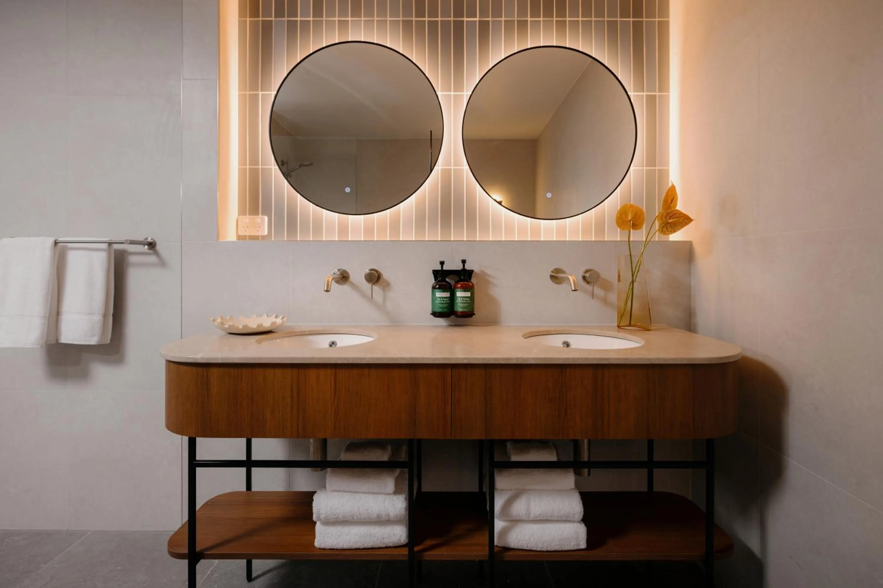 Bathroom in Crowne Plaza Adelaide Mawson Lakes by IHG