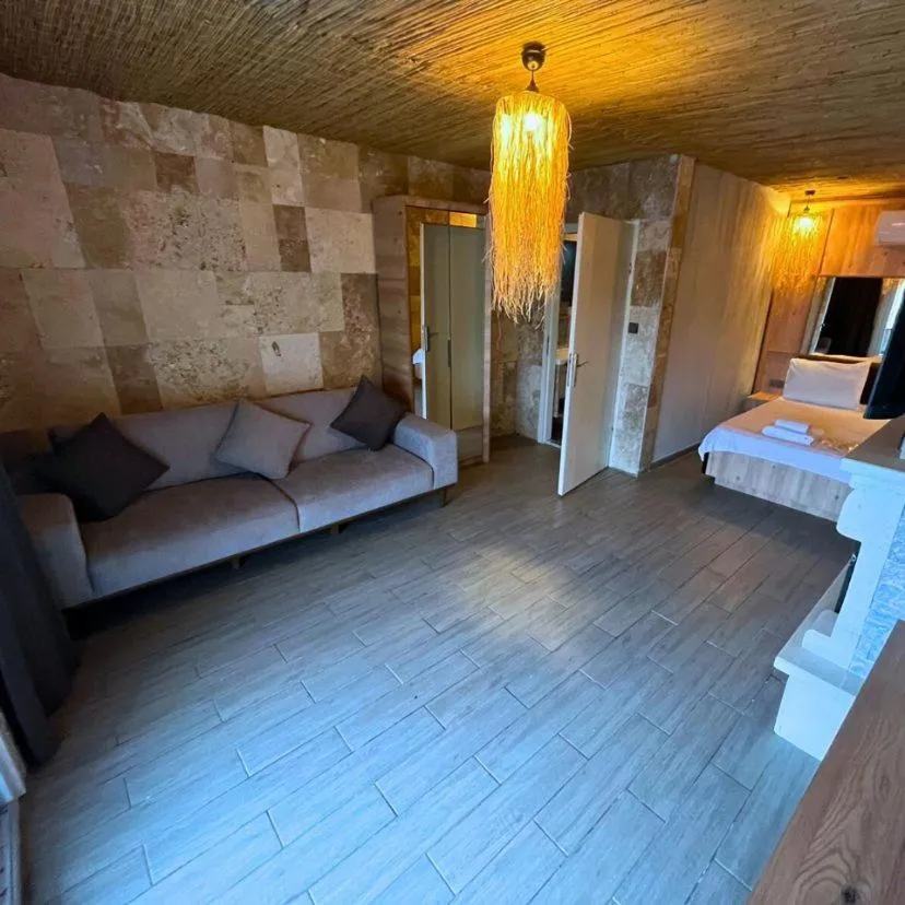 Communal lounge/ TV room, Bed in 216 North Hotel