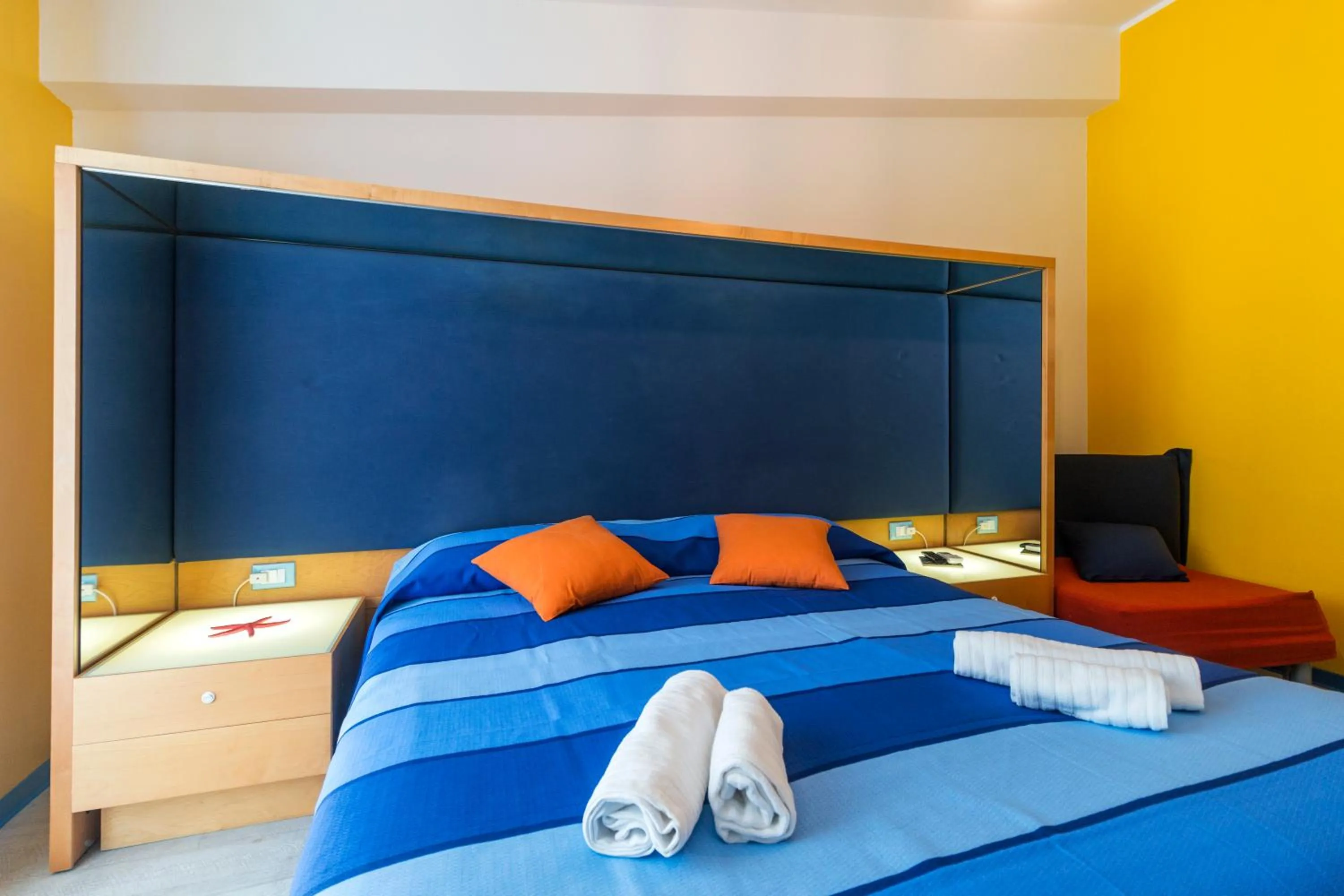 Bed in La Favorita Hotel