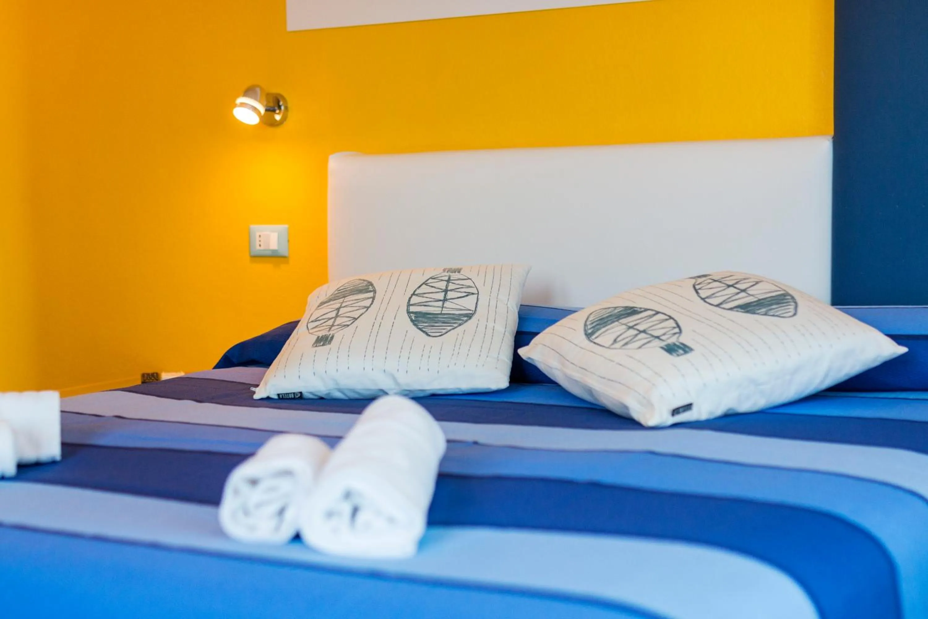 Bed in La Favorita Hotel