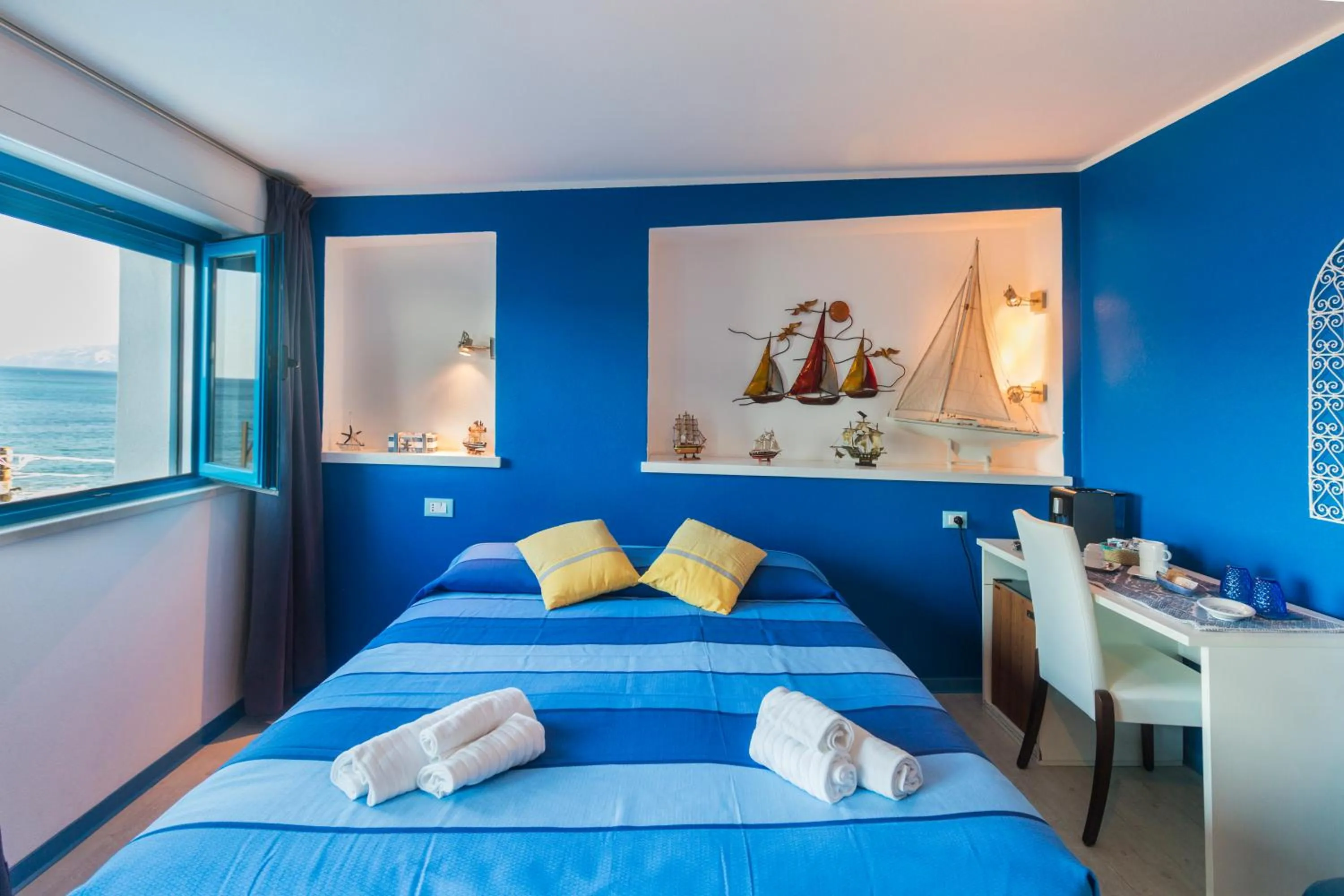 Bed in La Favorita Hotel