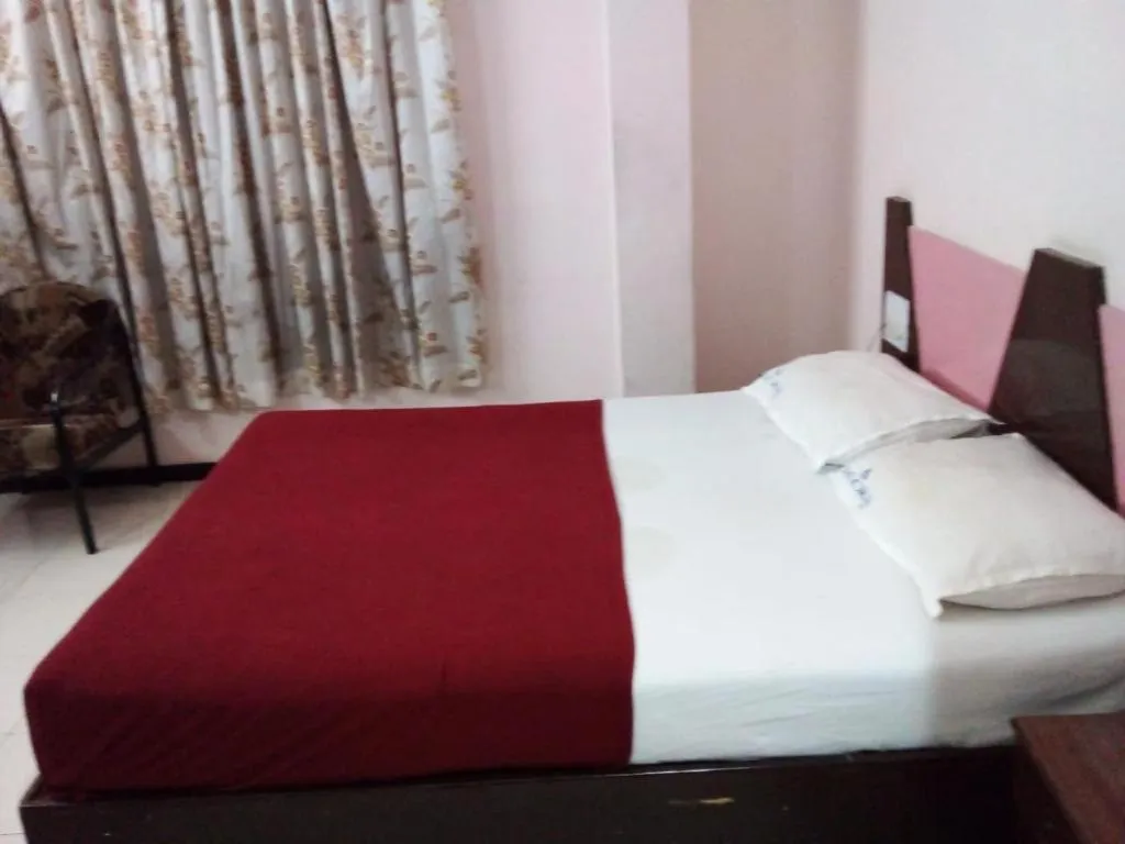 Bed in Asoka Inn