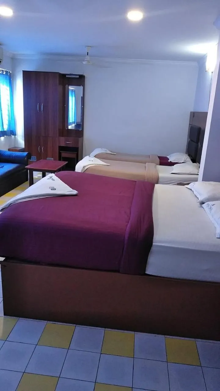 Bed in Asoka Inn