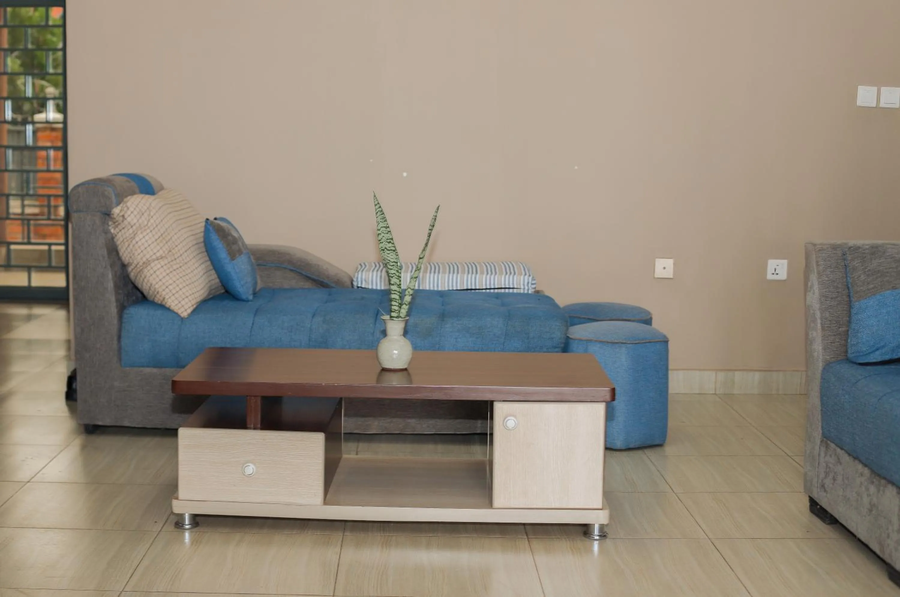 Communal lounge/ TV room in OMX Hotel Remera