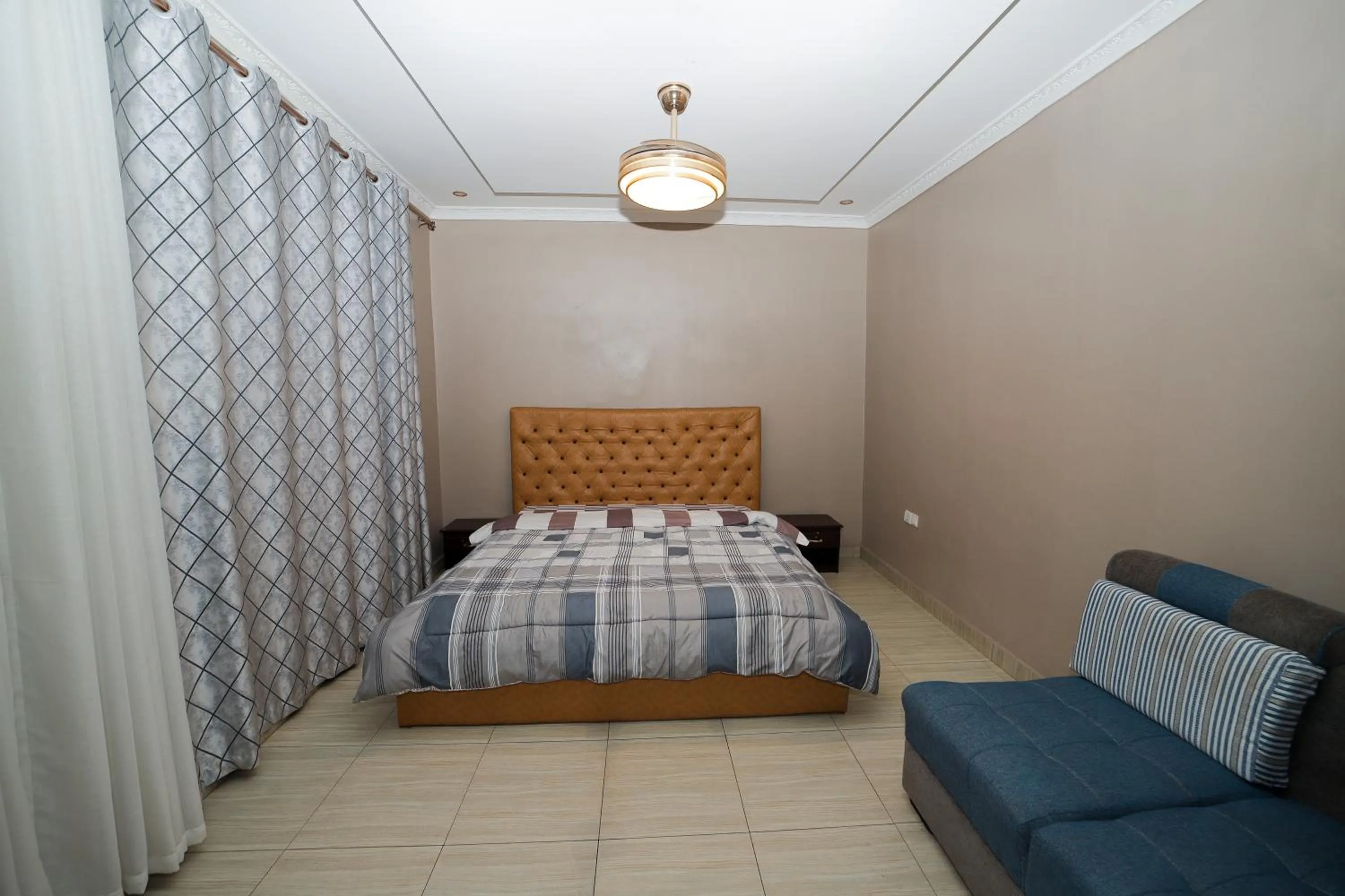 Bedroom in OMX Hotel Remera