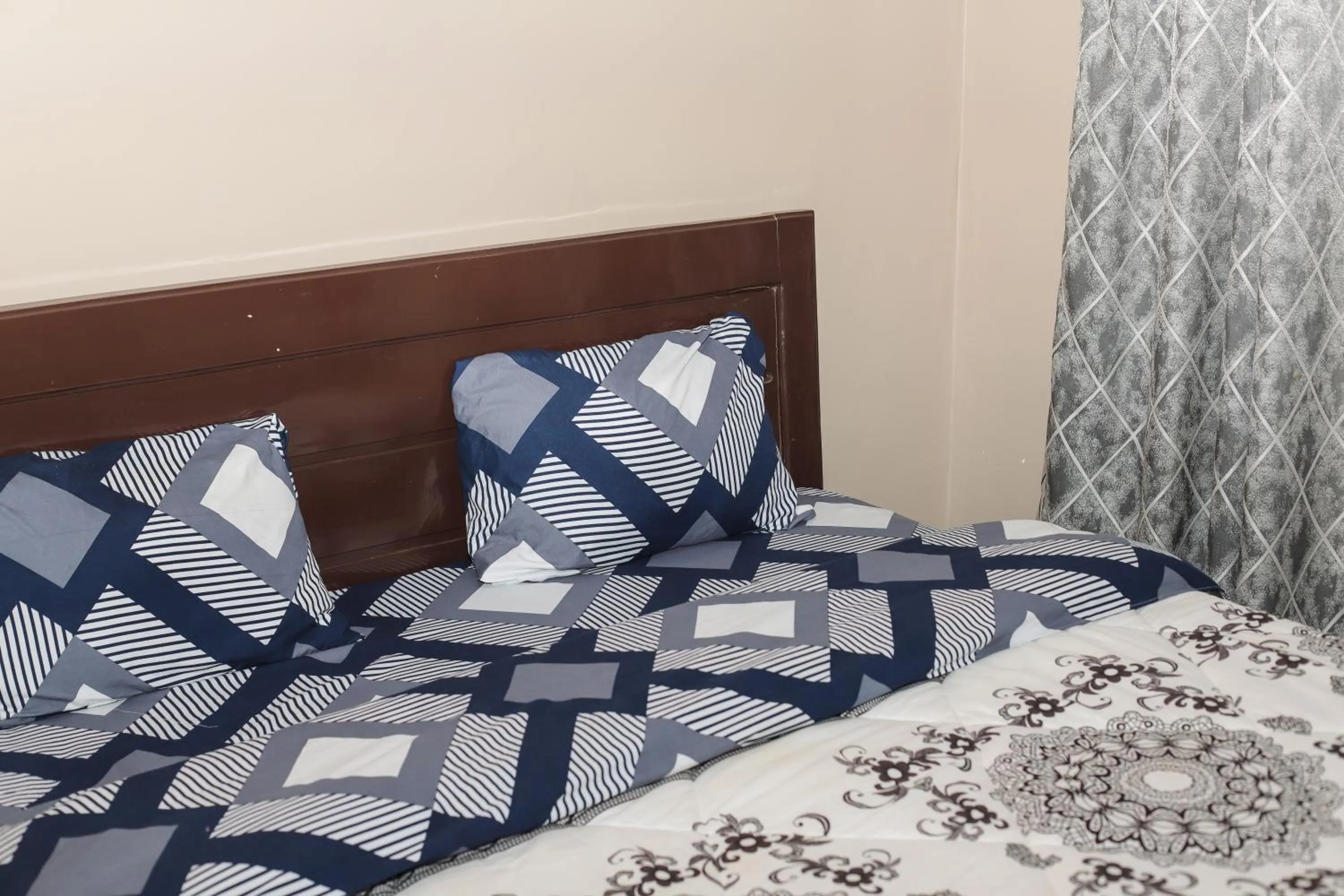 Bed in OMX Hotel Remera