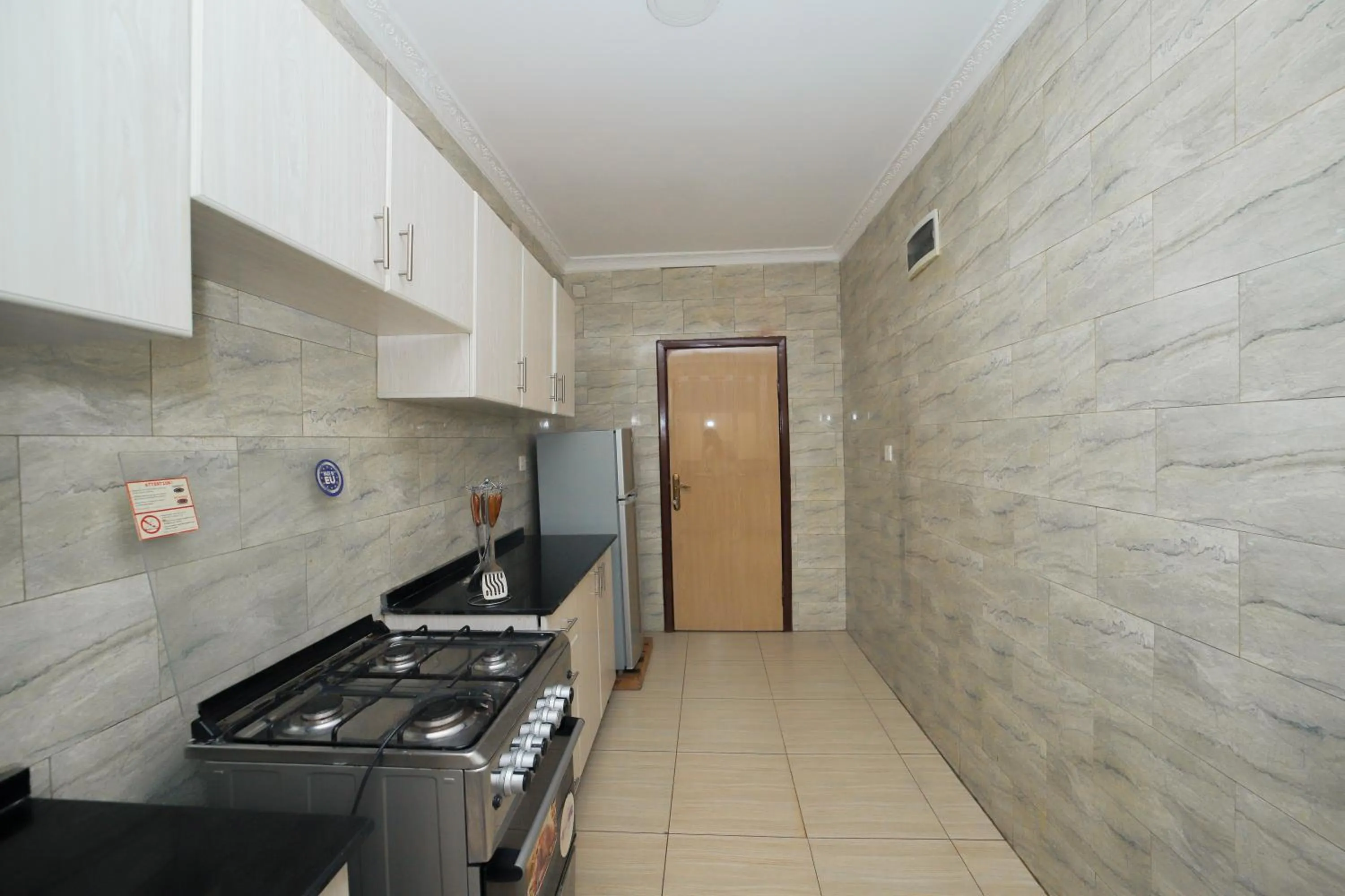 Kitchen or kitchenette in OMX Hotel Remera