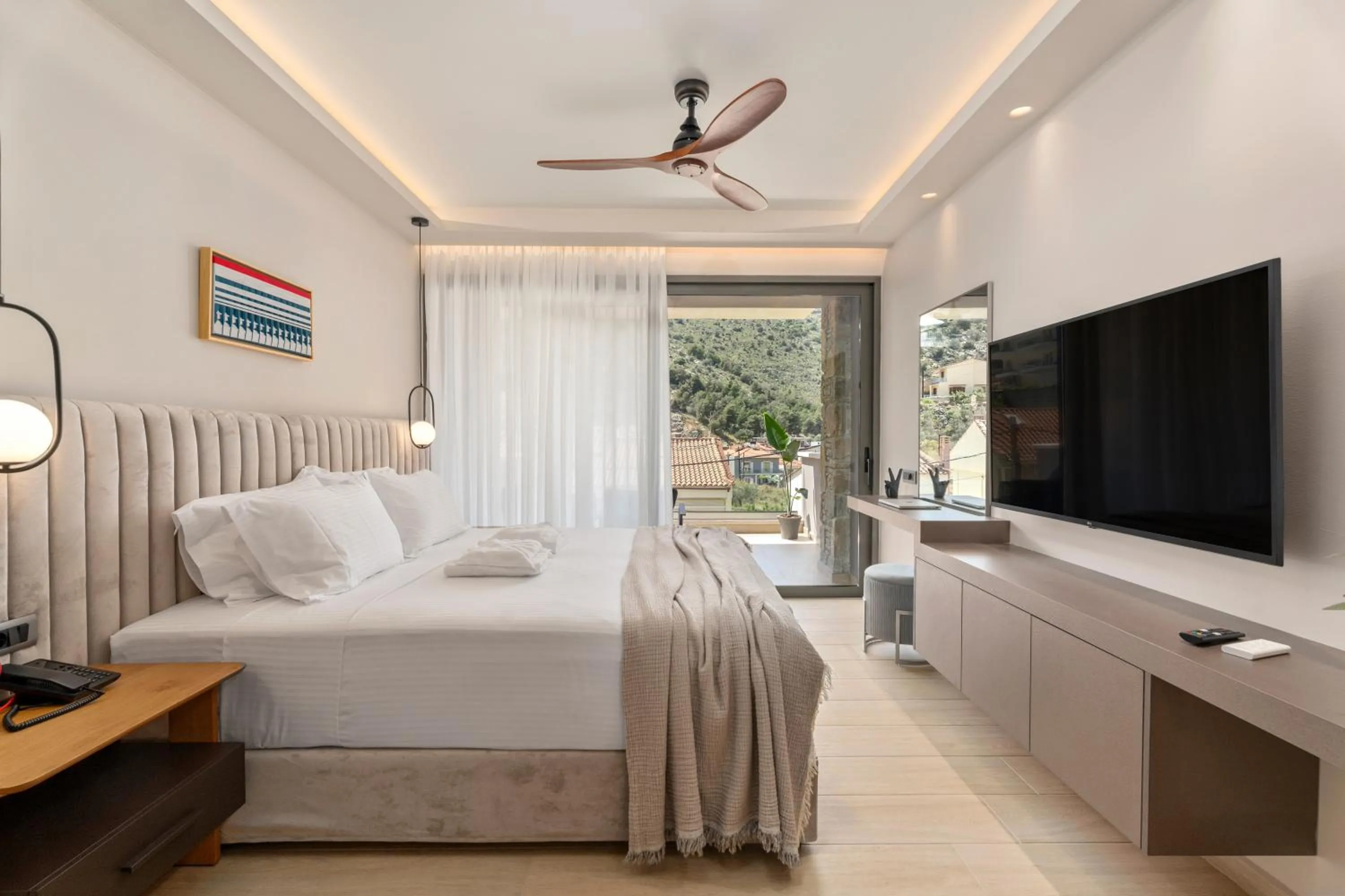 Bed in Ennea Muses Rooms and Suites