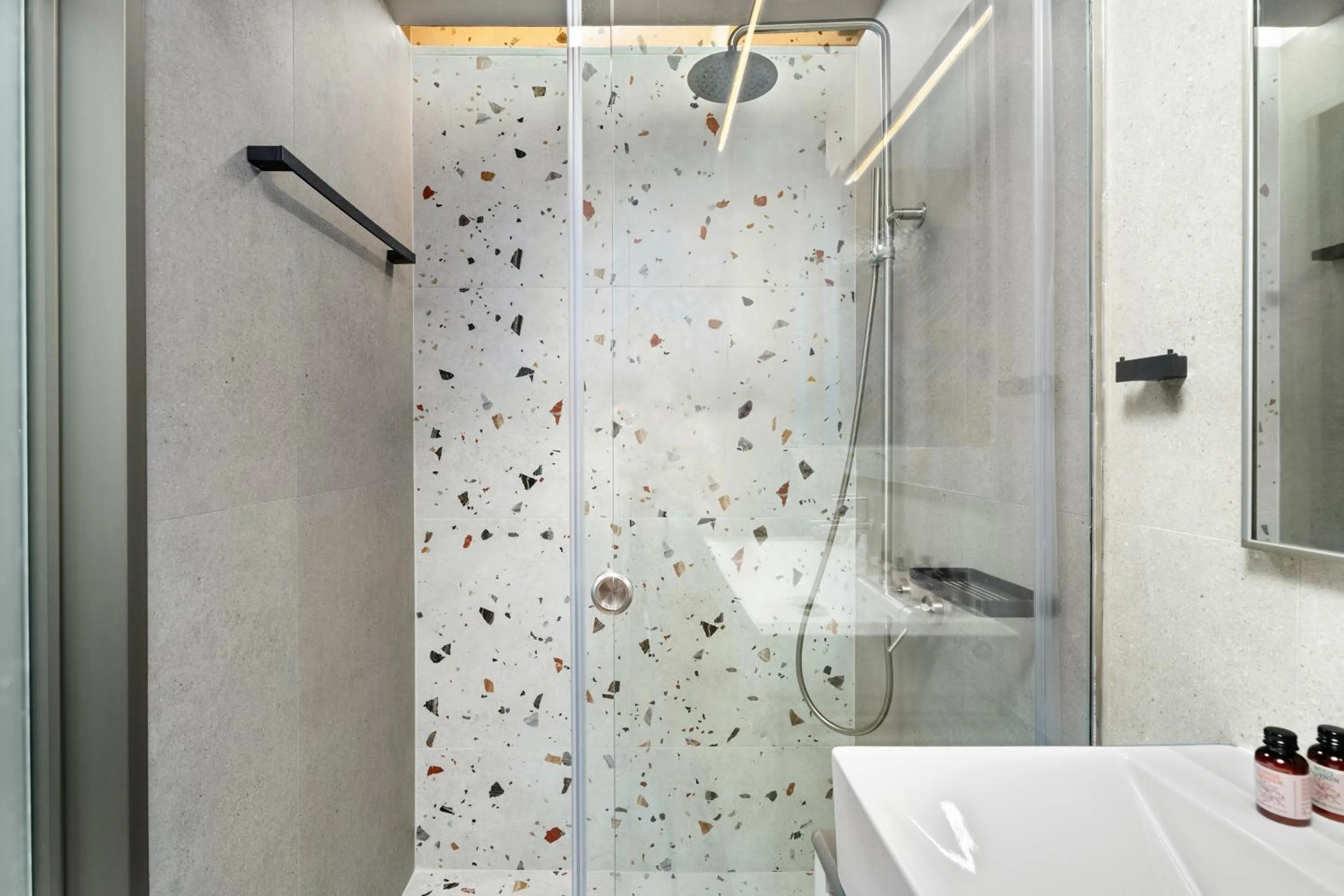 Shower in Ennea Muses Rooms and Suites