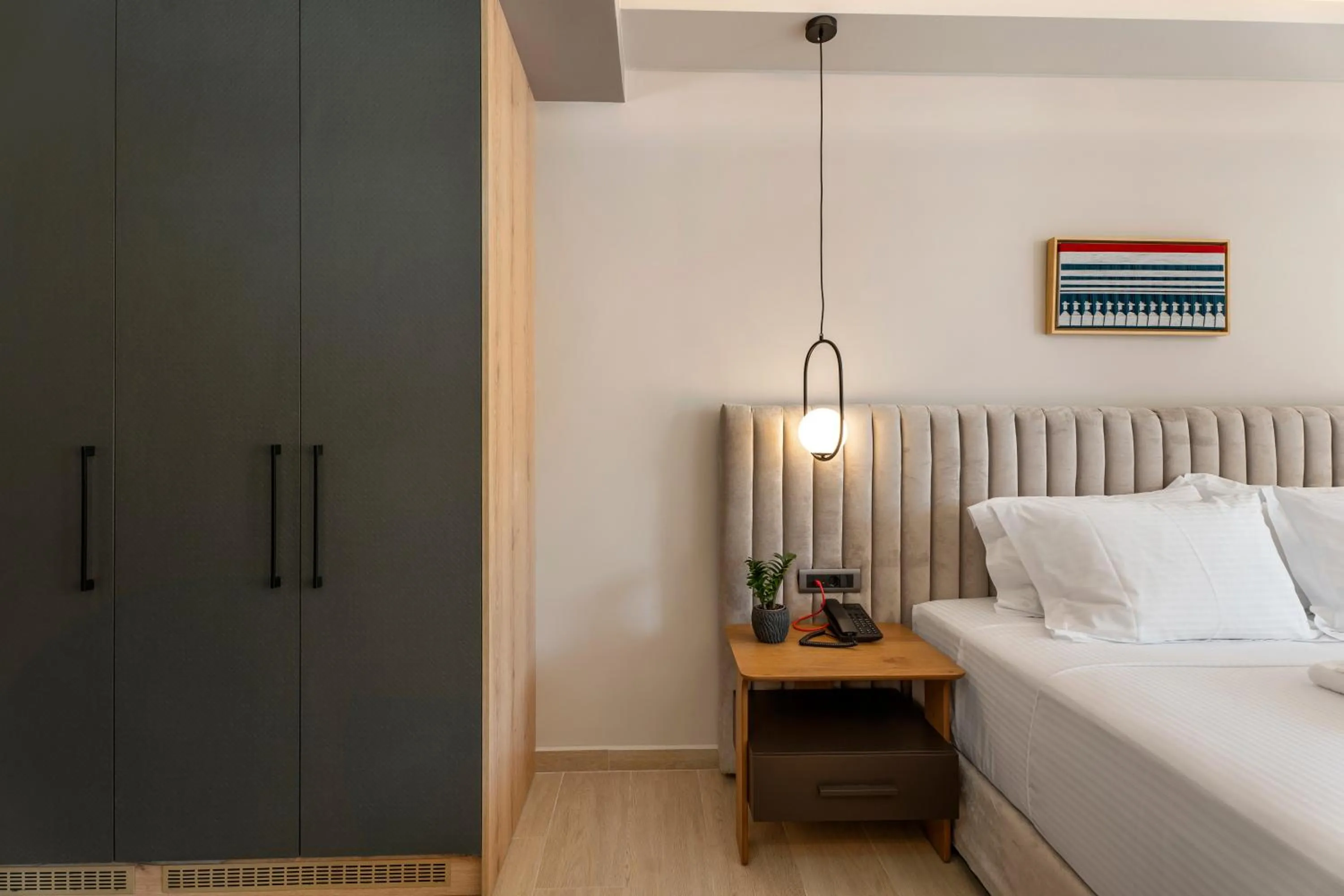 Bed in Ennea Muses Rooms and Suites