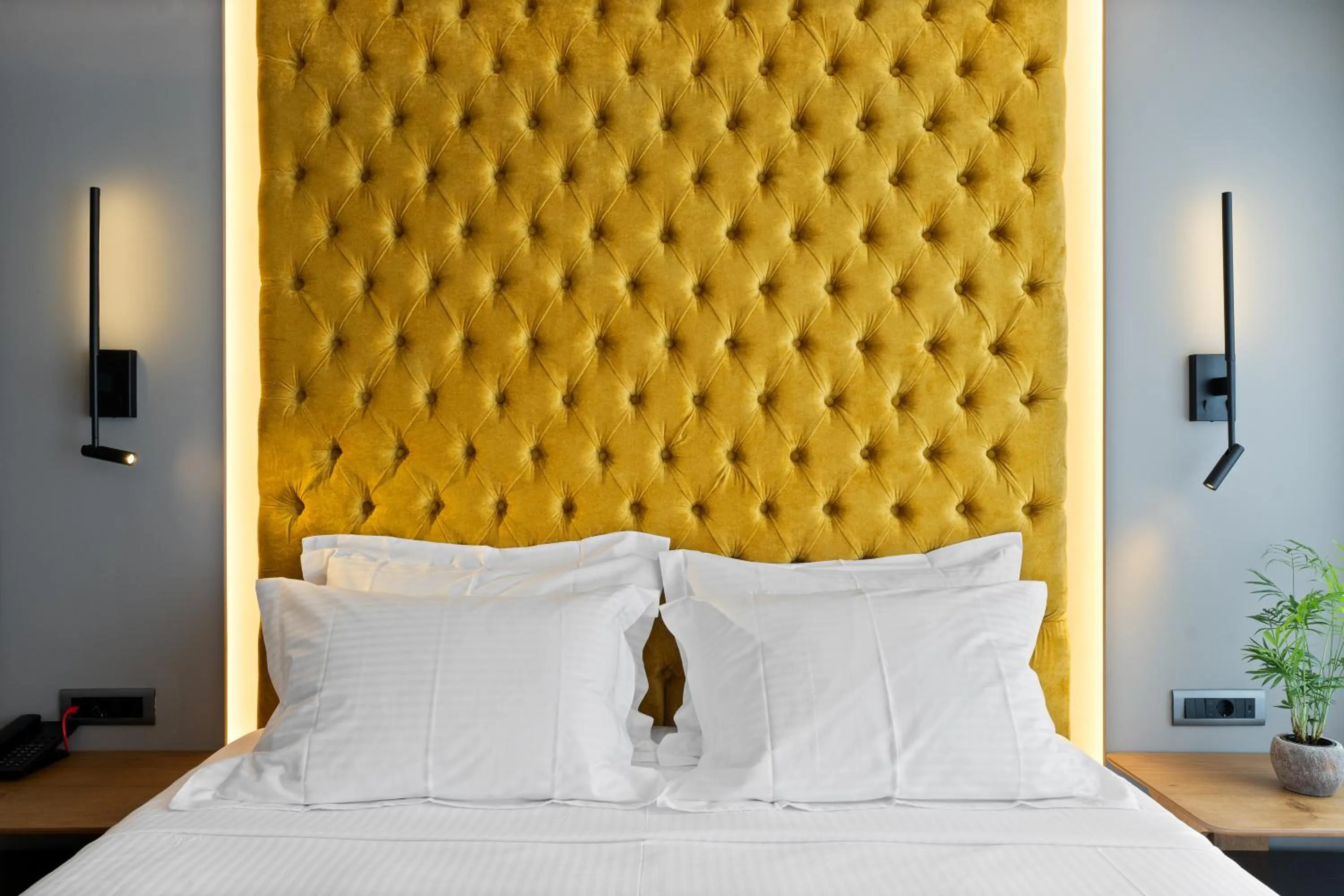 Bed in Ennea Muses Rooms and Suites