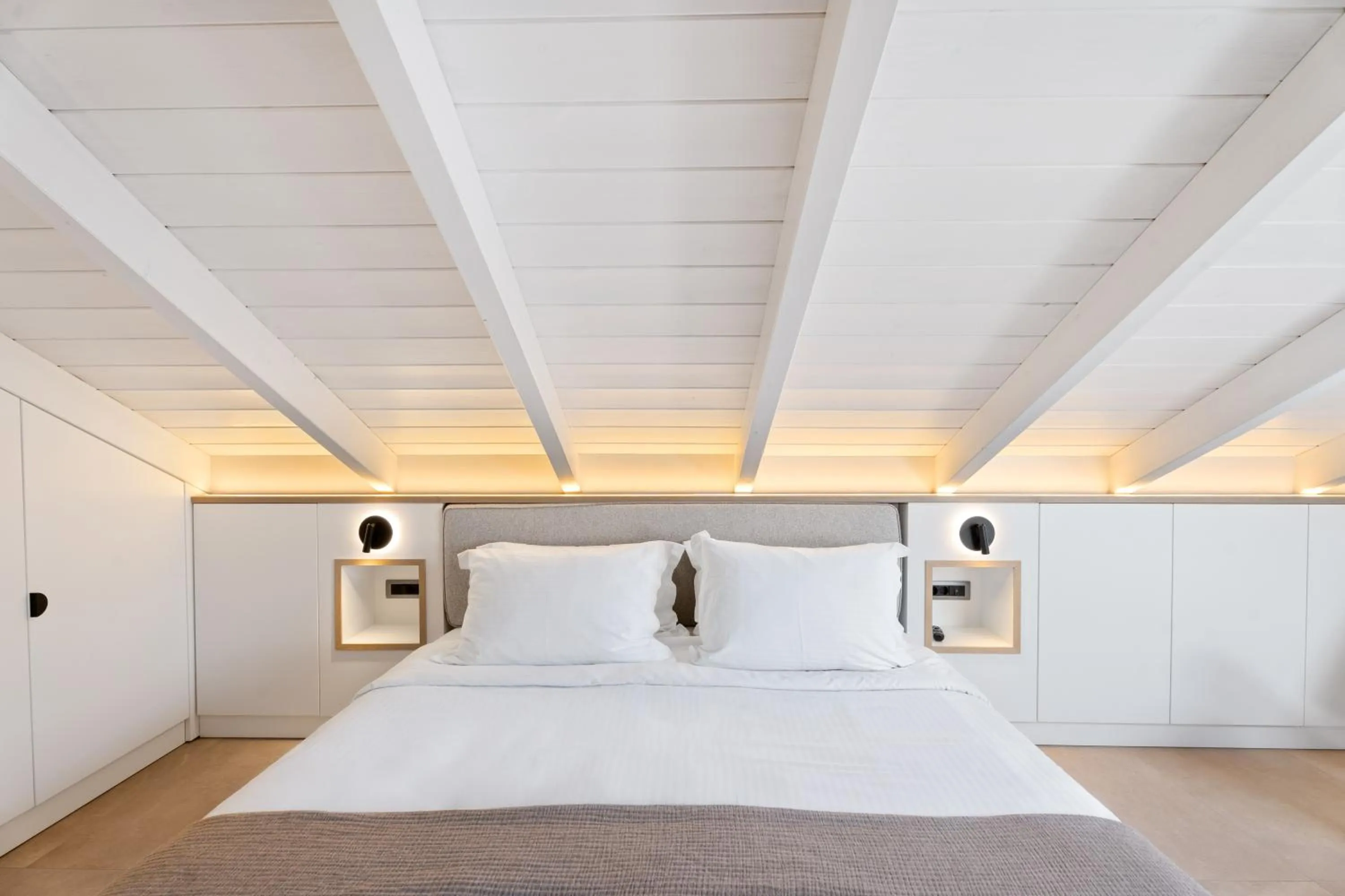 Bed in Ennea Muses Rooms and Suites