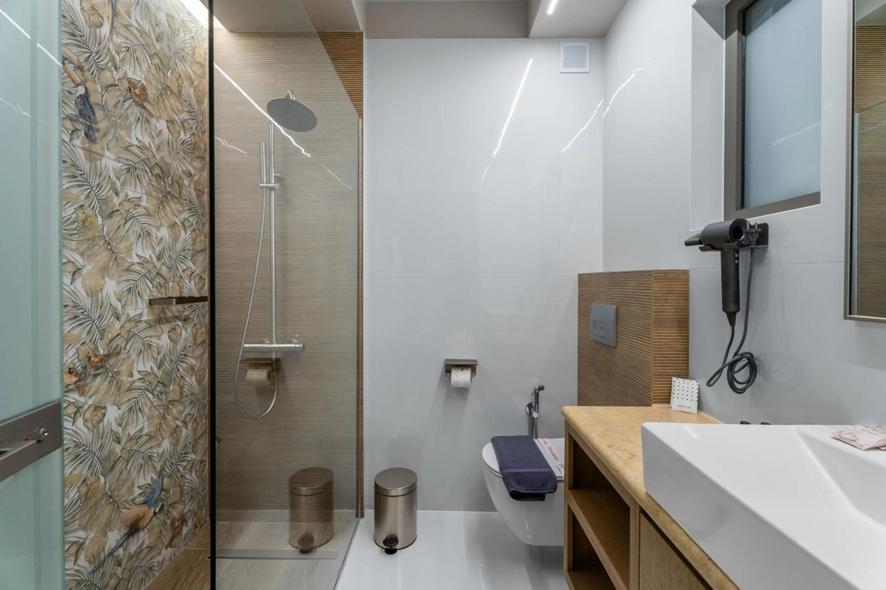 Shower in Ennea Muses Rooms and Suites