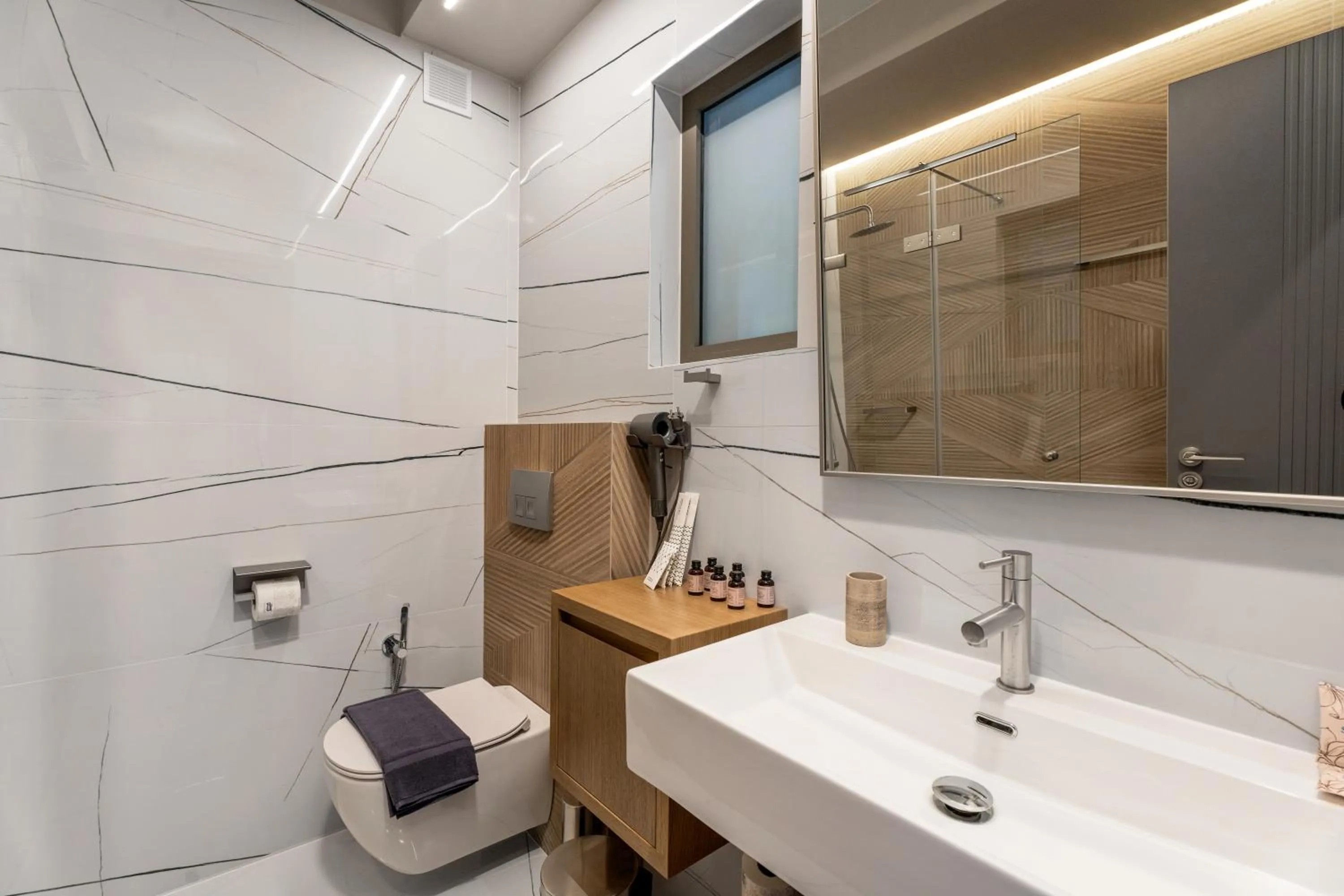 Bathroom in Ennea Muses Rooms and Suites