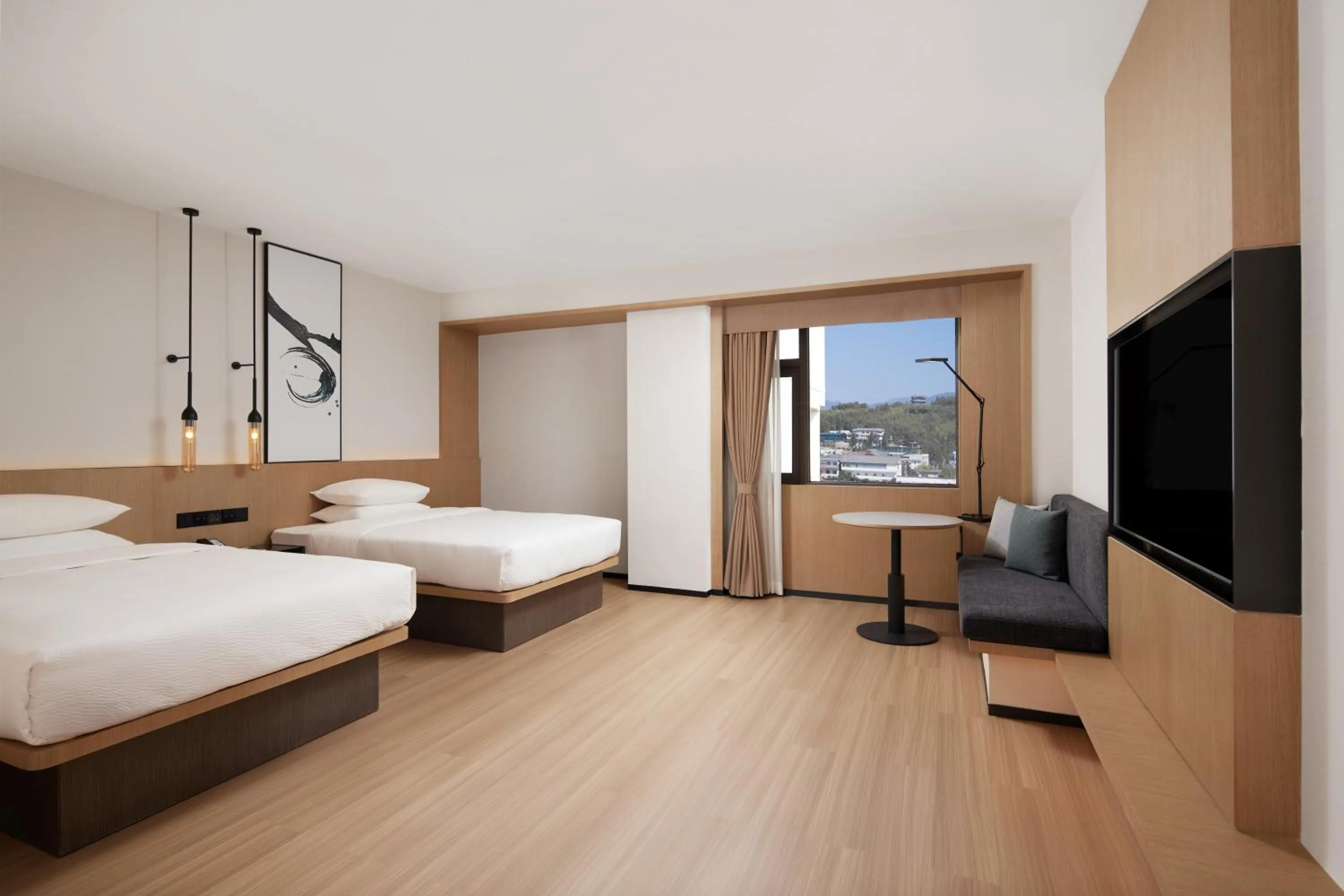 Photo of the whole room, Bed in Fairfield by Marriott Lijiang Ancient Town