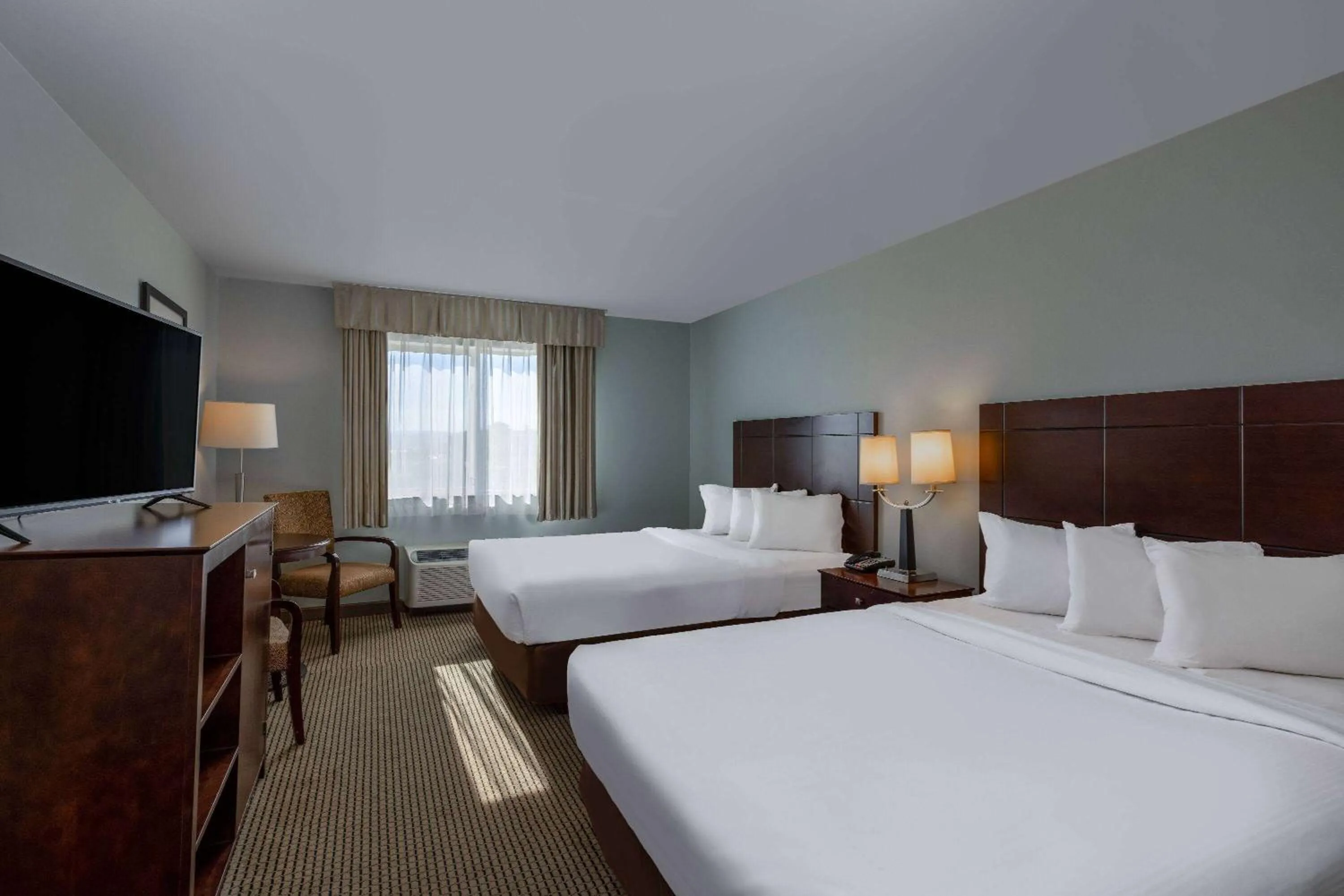 Photo of the whole room, Bed in Baymont by Wyndham Rapid City