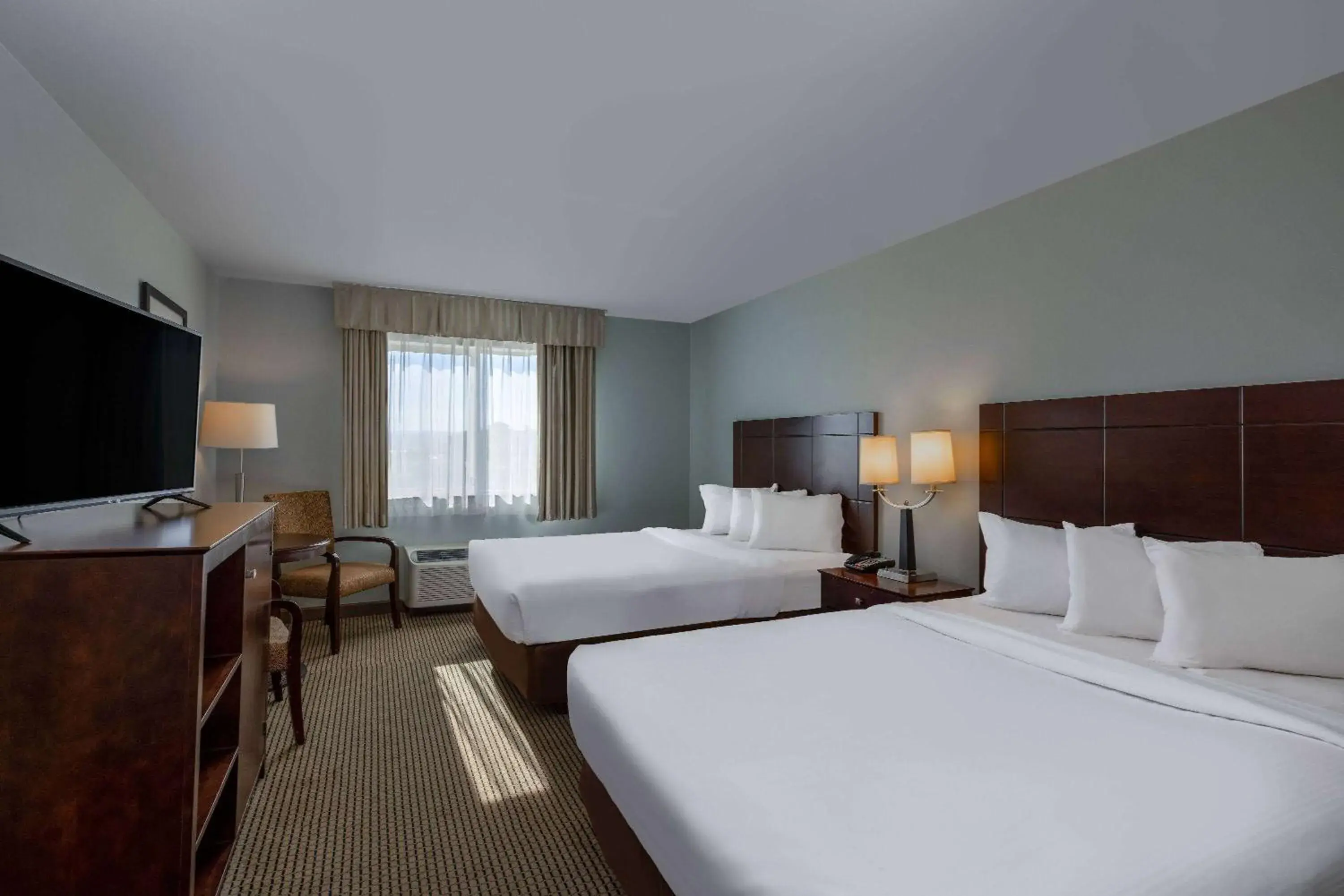 Queen Room with Two Queen Beds and Roll-in Shower - Mobility Accessible/Non-Smoking in Baymont by Wyndham Rapid City Queen Room with Two Queen Beds and Roll-in Shower - Mobility Accessible/Non-Smoking in Baymont by Wyndham Rapid City