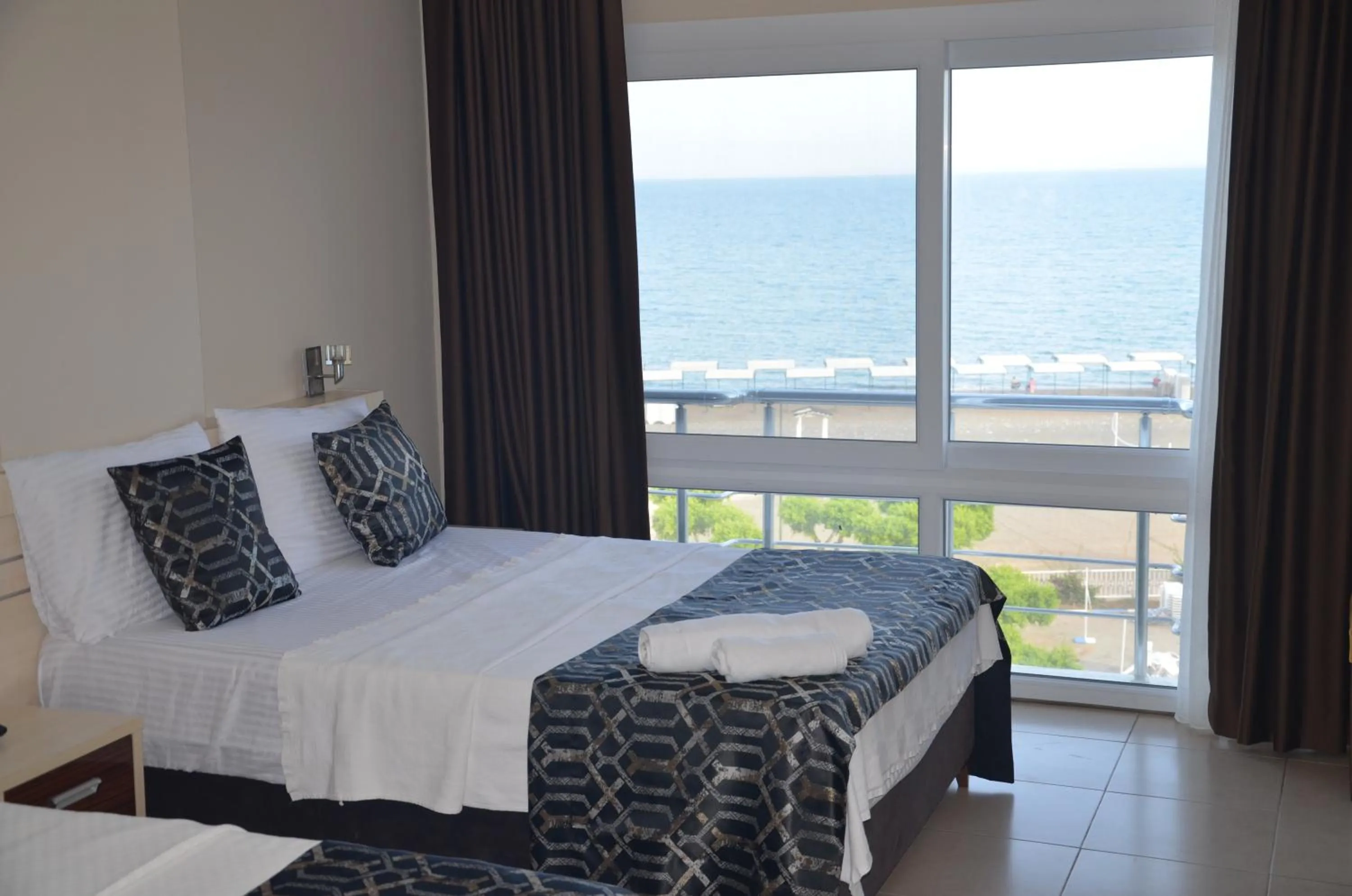 Bed in Denizkumu Hotel