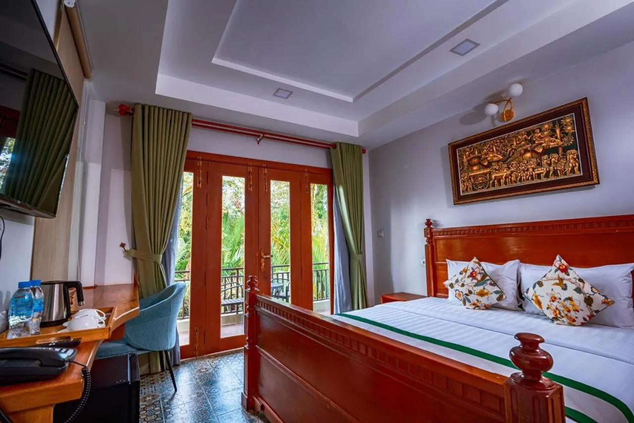 Bed in Ganesha Kampot Resort