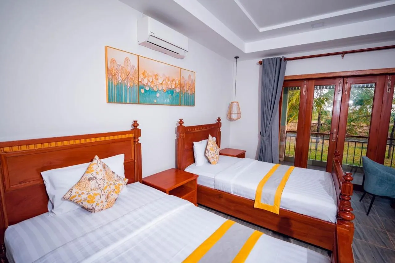 Bed in Ganesha Kampot Resort