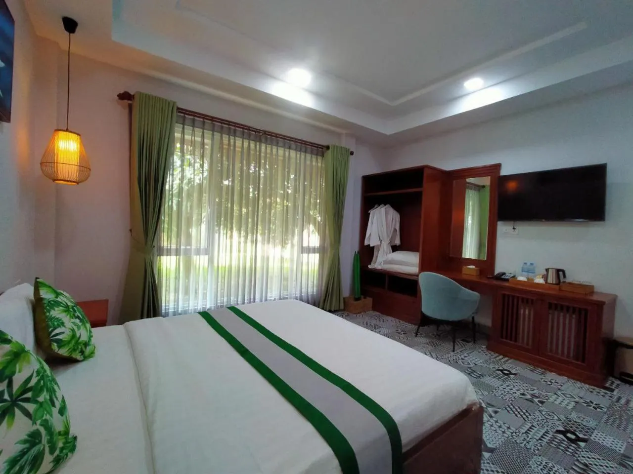 Bed in Ganesha Kampot Resort