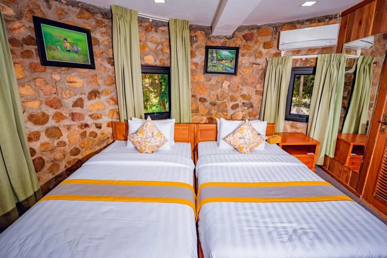 Bed in Ganesha Kampot Resort