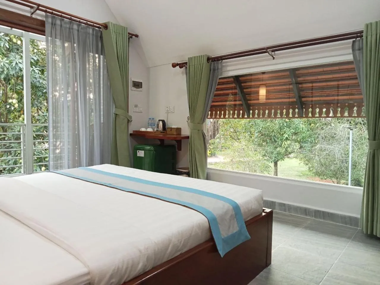 Bed in Ganesha Kampot Resort