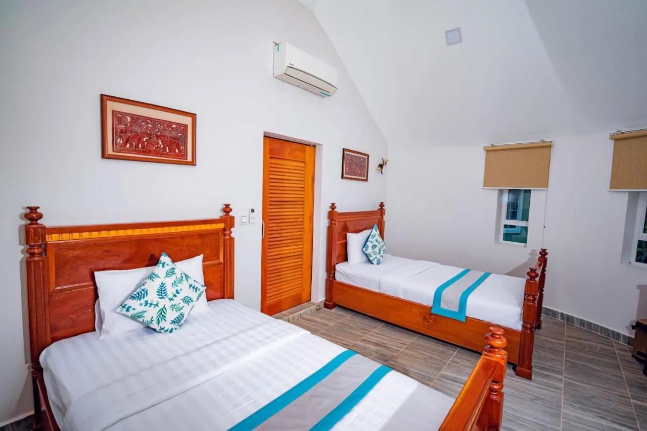 Bed in Ganesha Kampot Resort