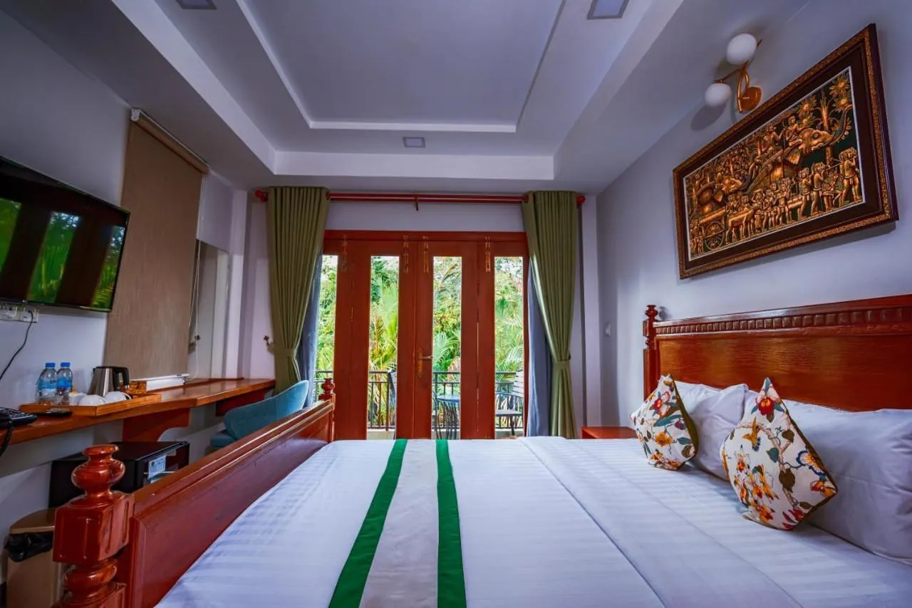 Bed in Ganesha Kampot Resort