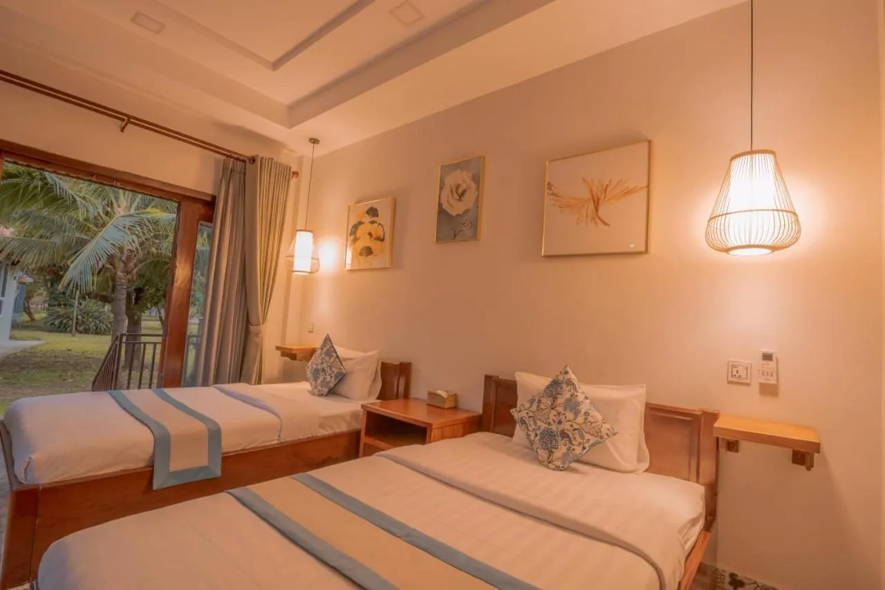 Bed in Ganesha Kampot Resort