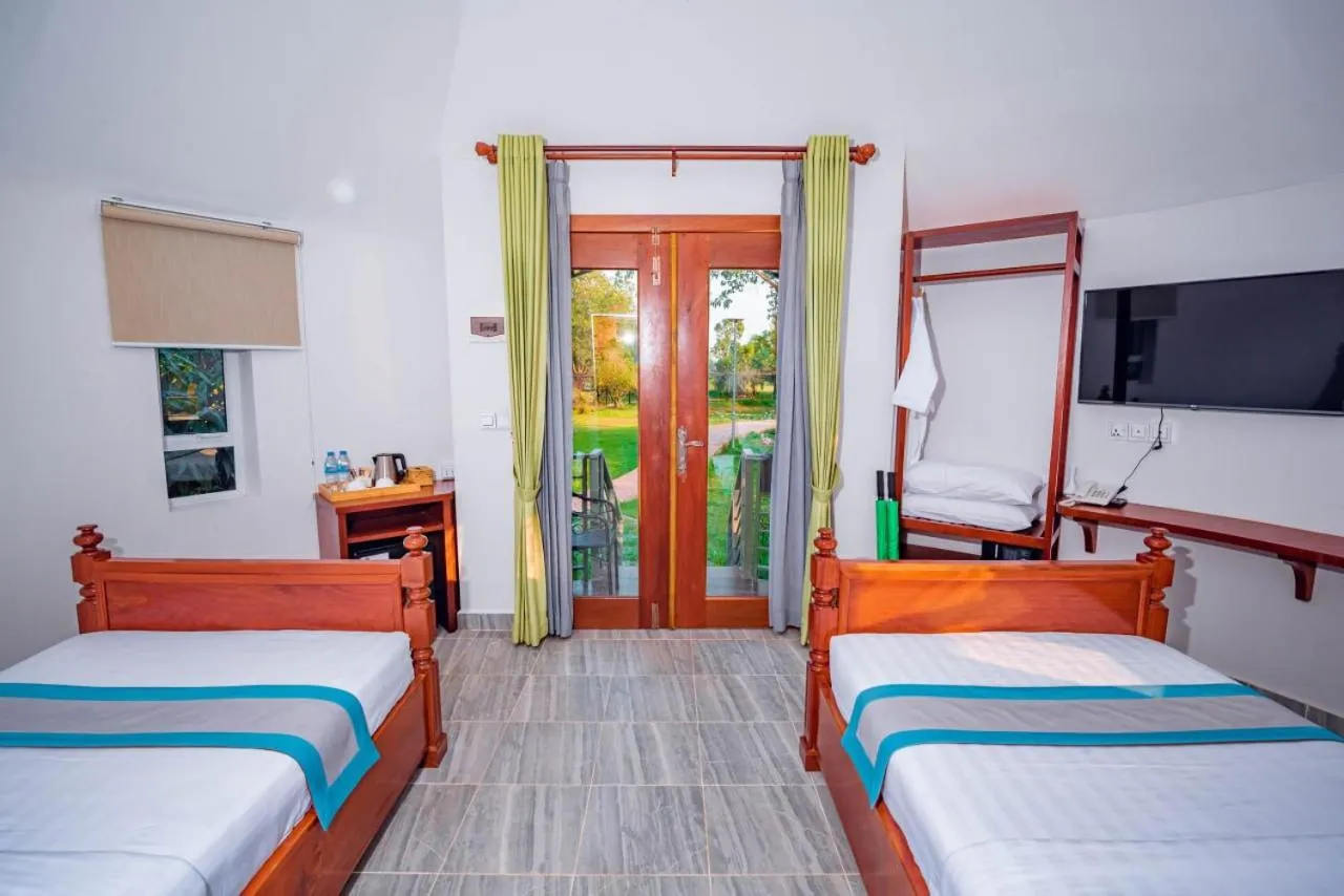 Bed in Ganesha Kampot Resort