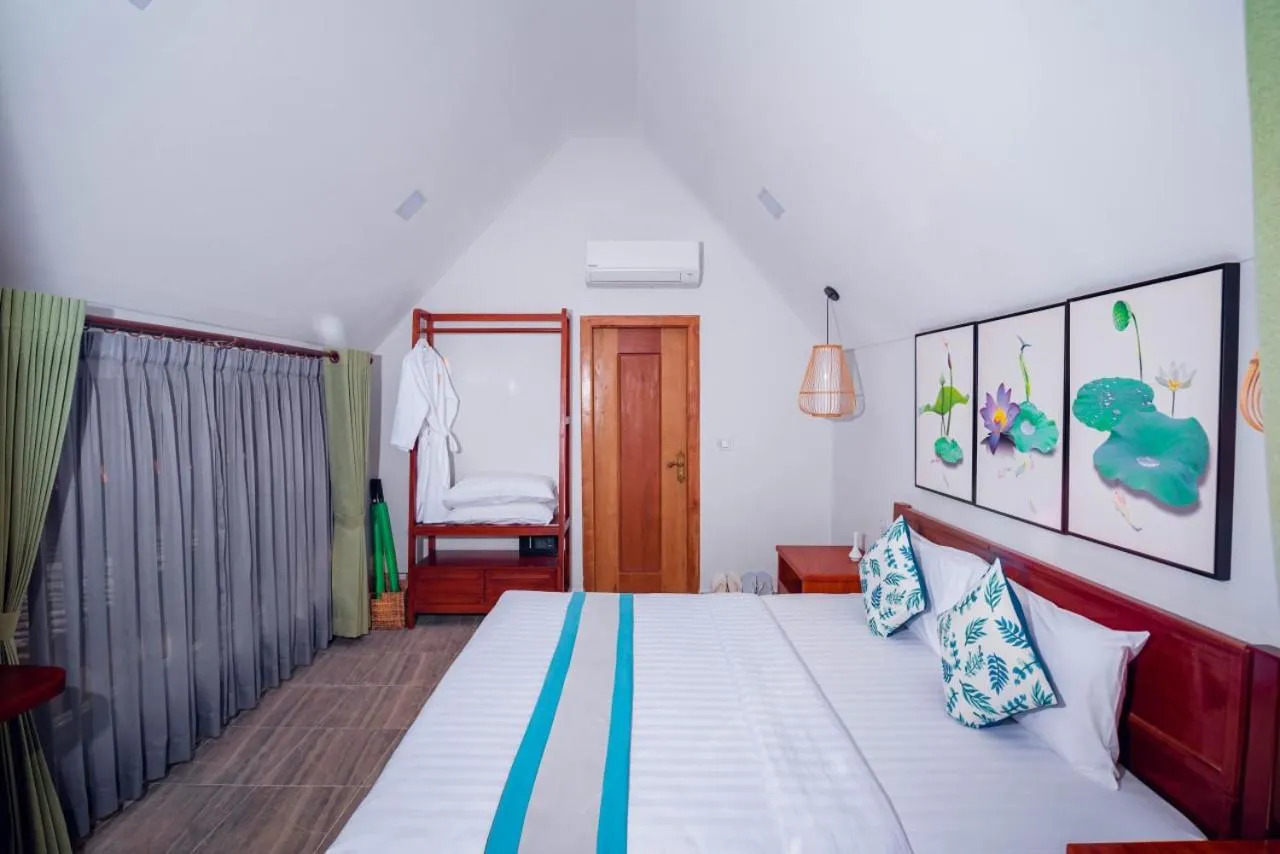 Bed in Ganesha Kampot Resort