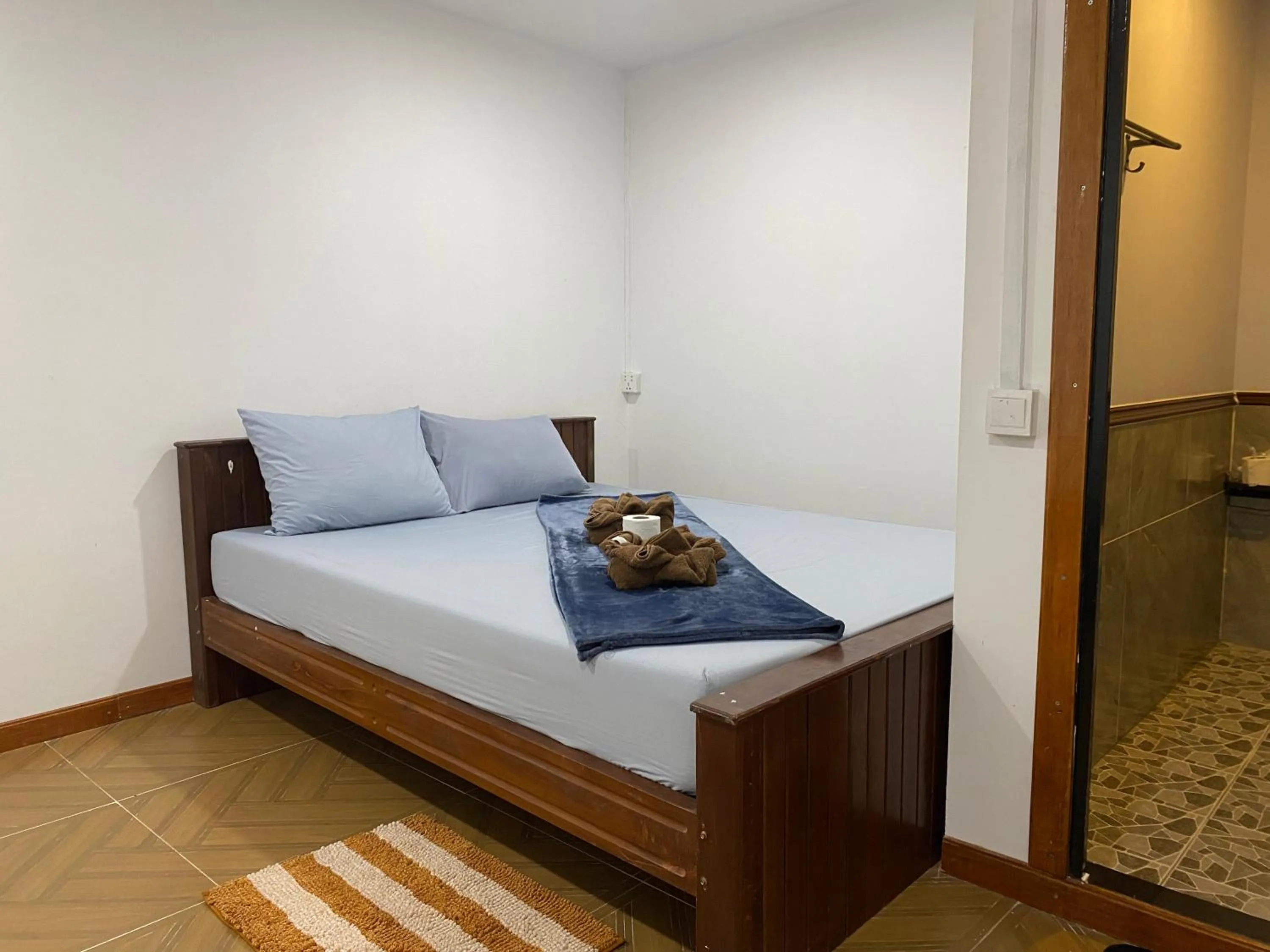 Bed in White Rose Guesthouse