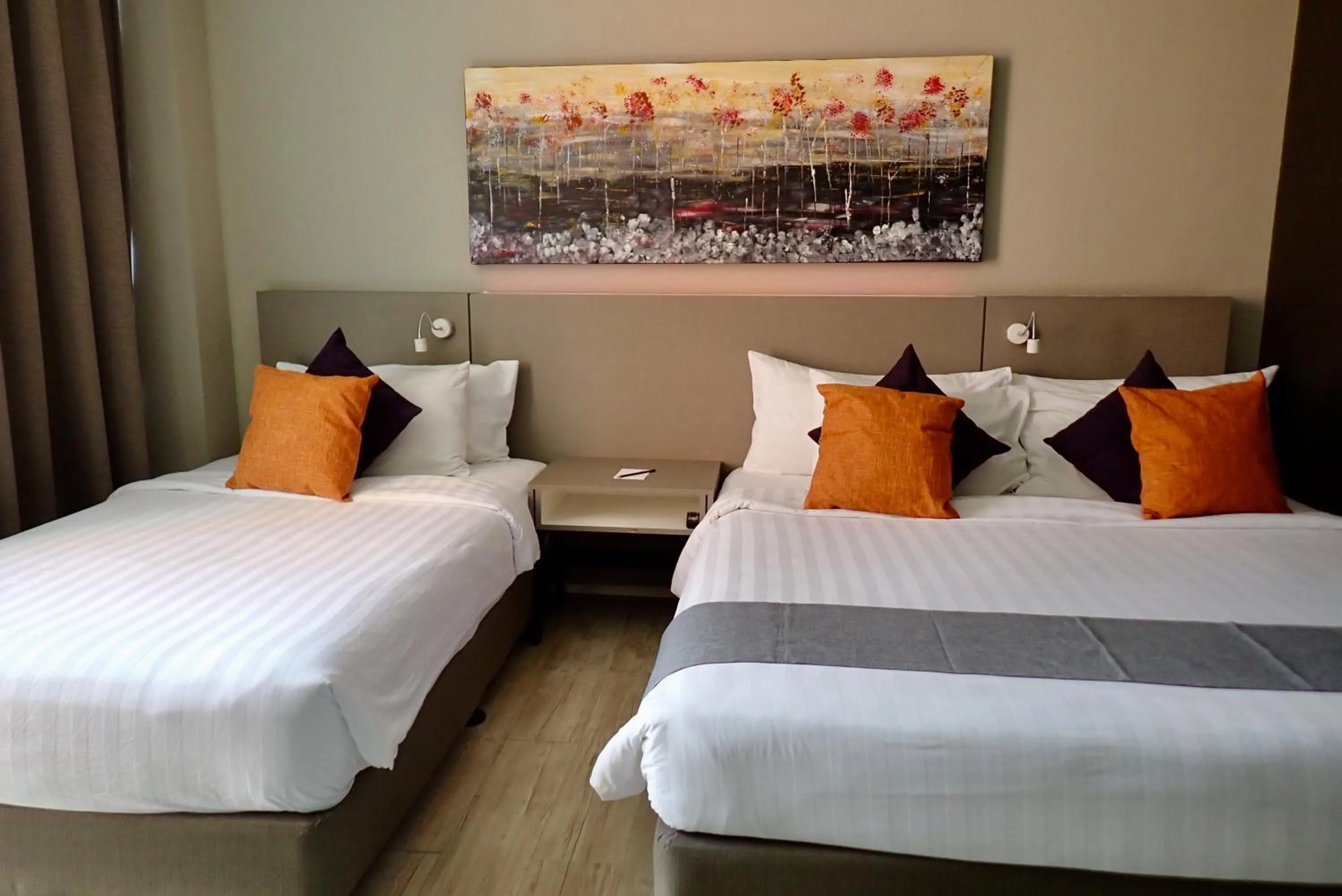 Bed in Qliq Damansara Hotel