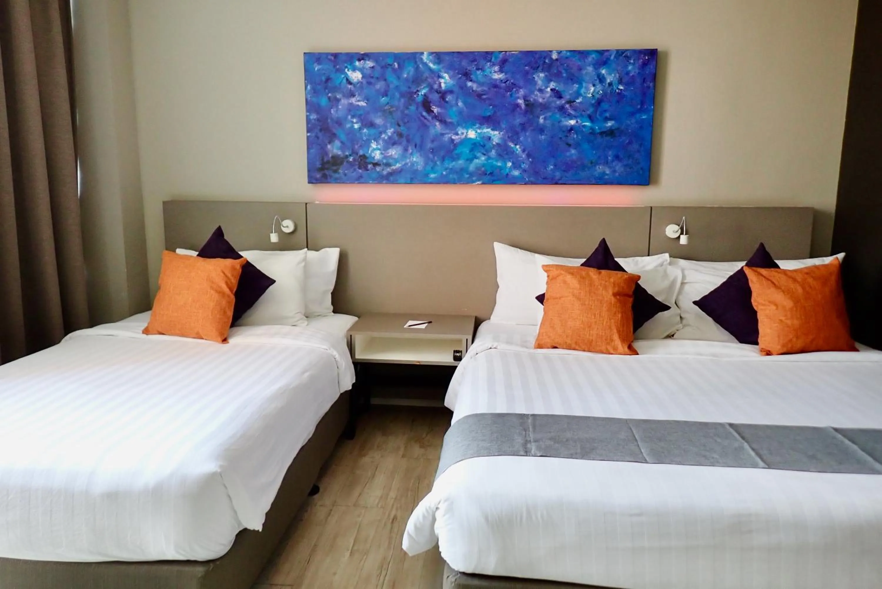 Bed in Qliq Damansara Hotel