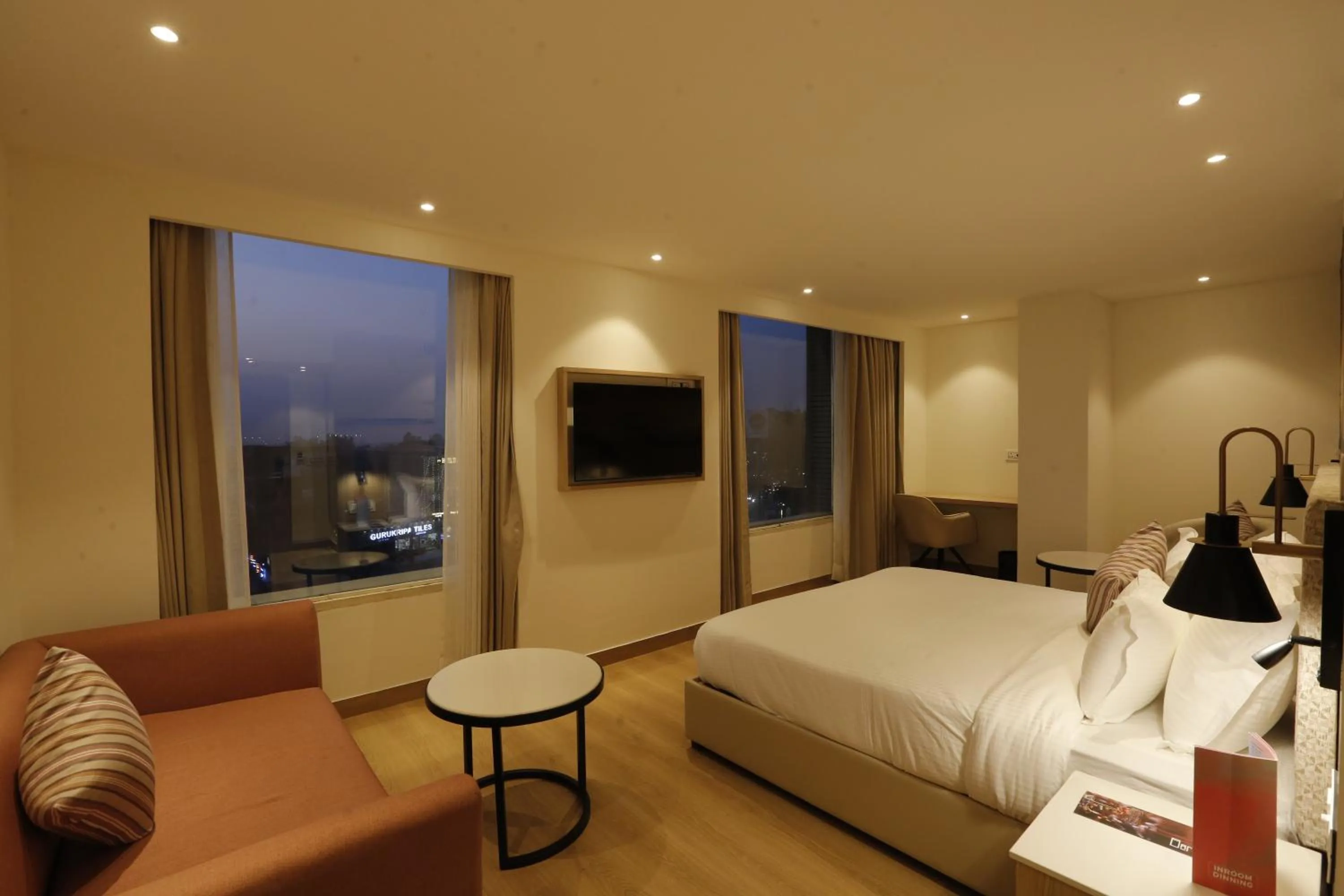 View (from property/room), Bed in Tulip Inn Zirakpur