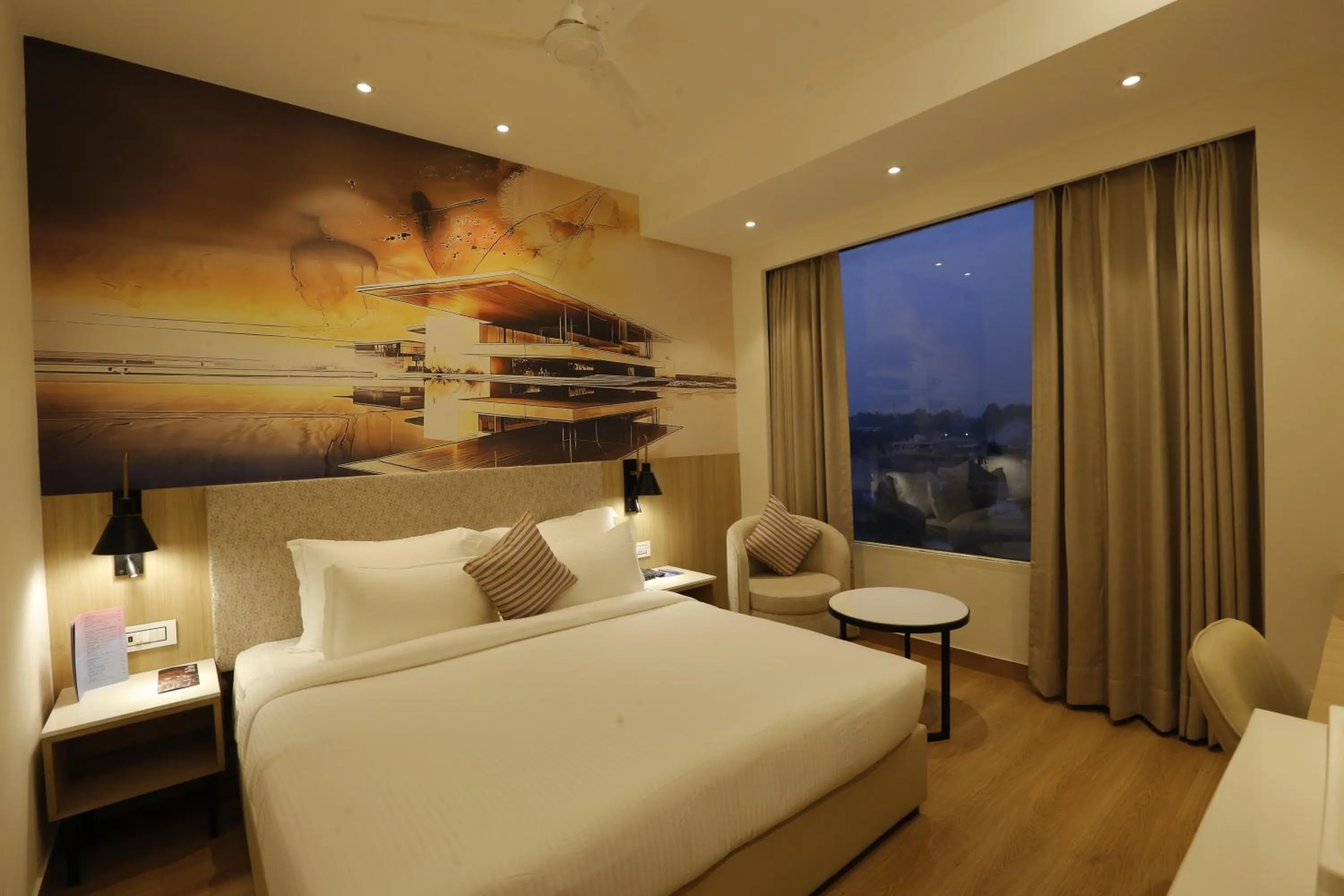 View (from property/room), Bed in Tulip Inn Zirakpur