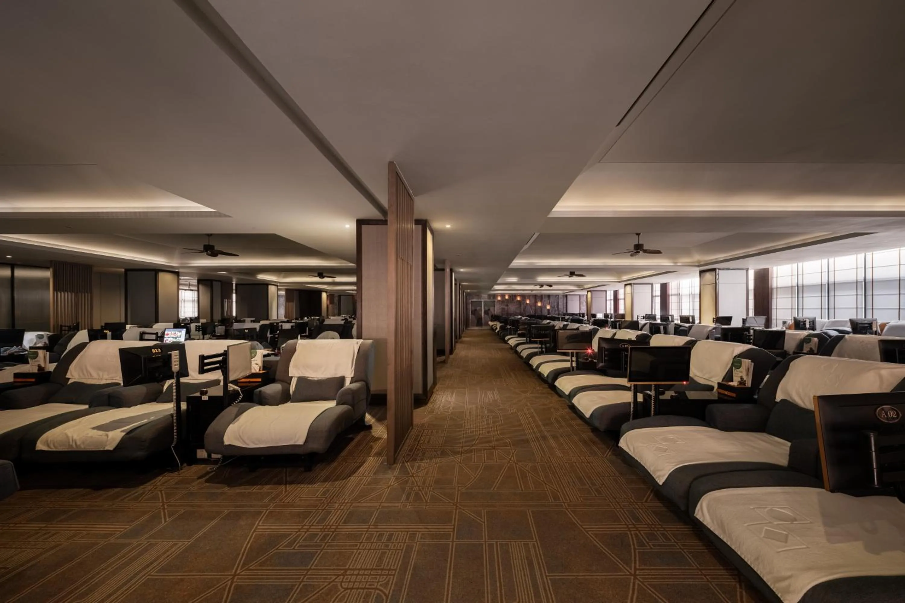 Communal lounge/ TV room in Zhuhai Palm Spring Hotel