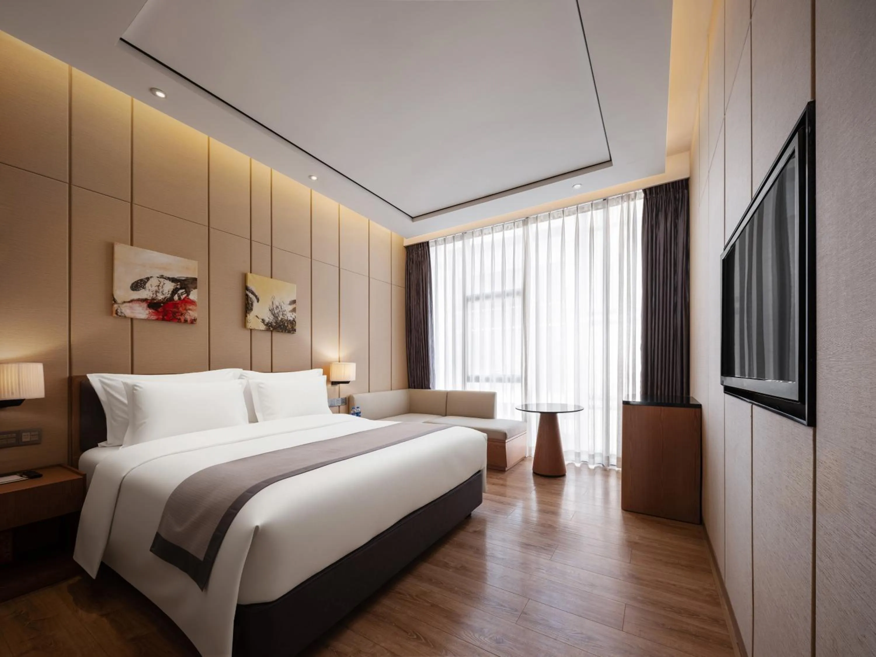 Bed in Zhuhai Palm Spring Hotel