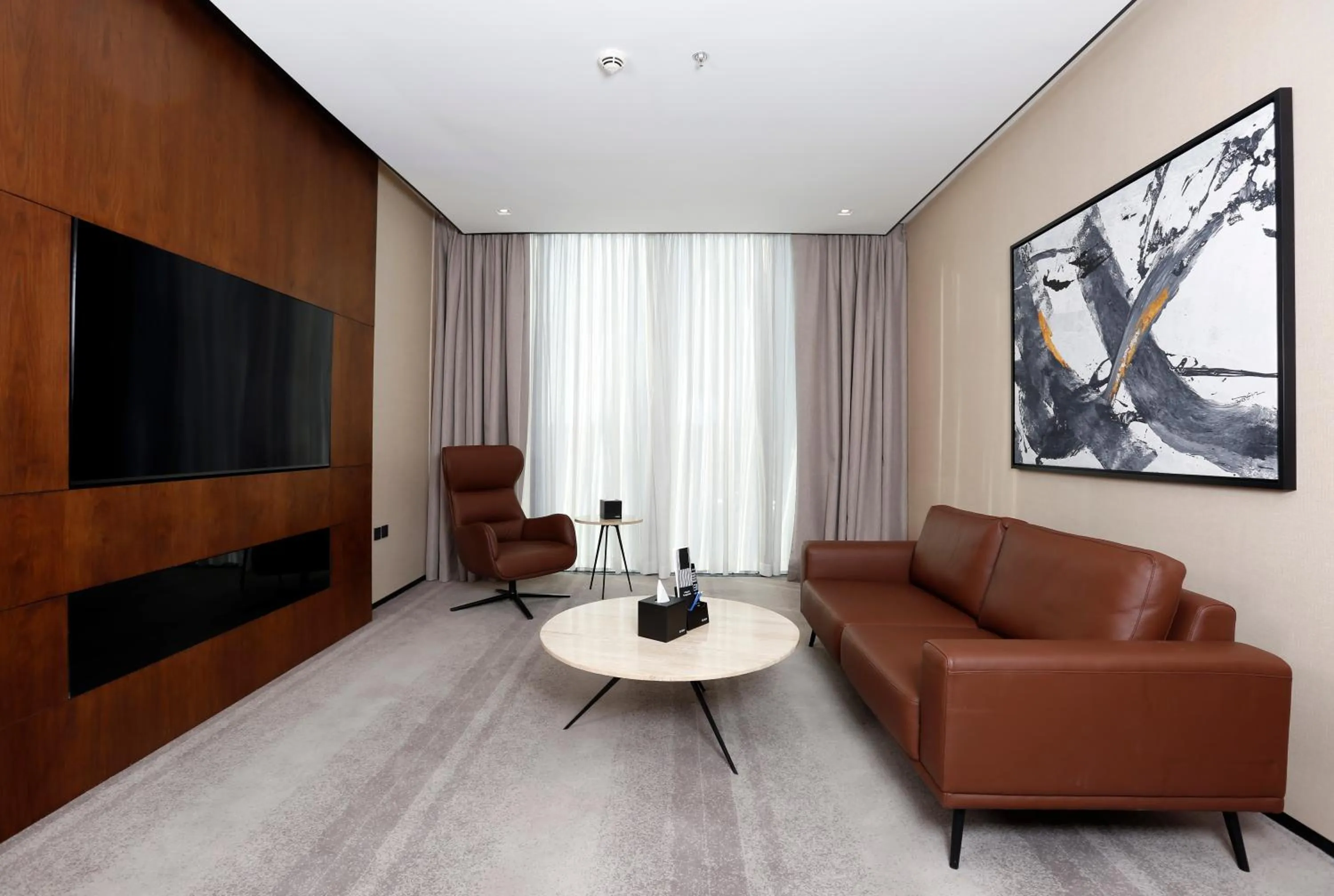 Communal lounge/ TV room in ALMA Hotel Riyadh