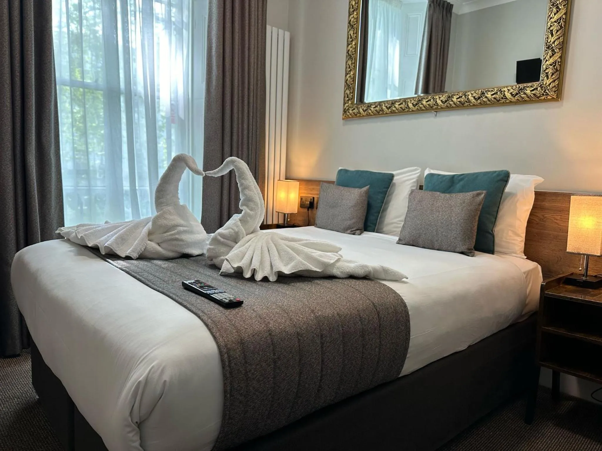 Bed in Tudor Court Hotel